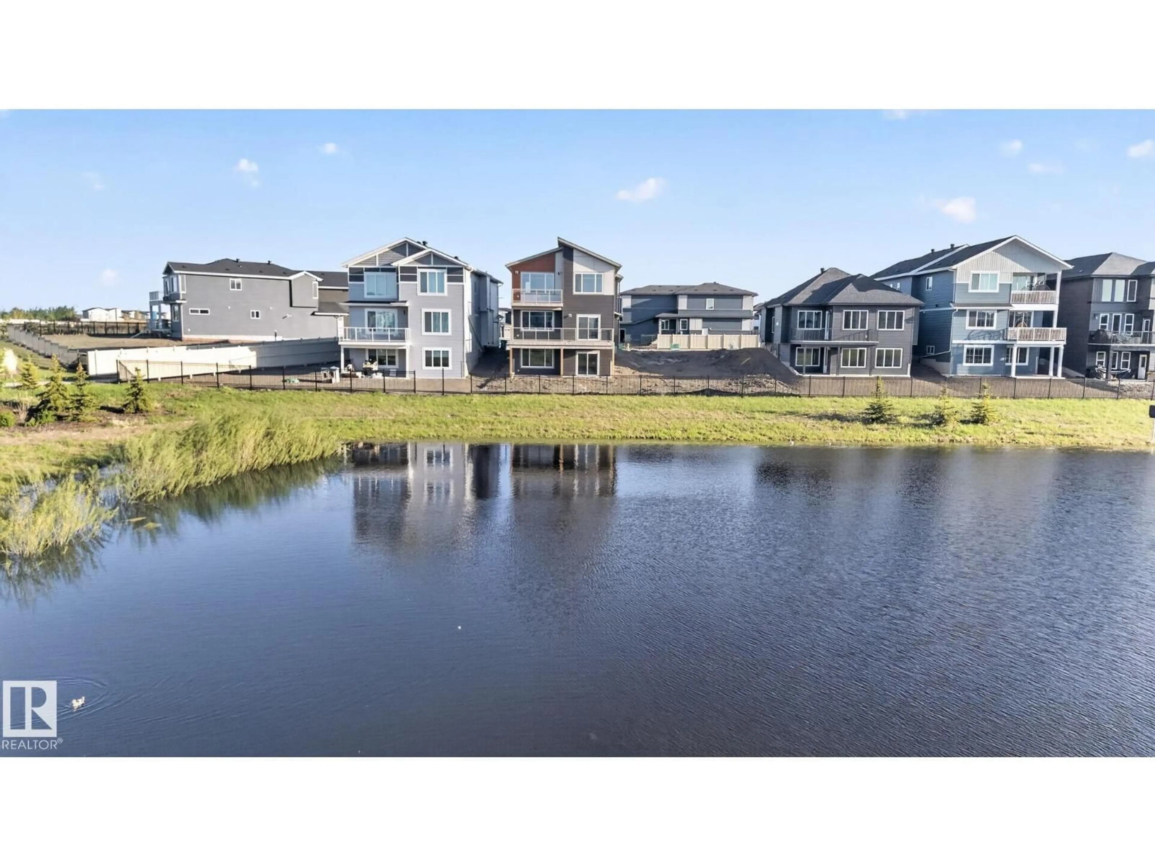 A pic from outside/outdoor area/front of a property/back of a property/a pic from drone, water/lake/river/ocean view for 76 ELDRIDGE PT, St. Albert Alberta T8N8C4