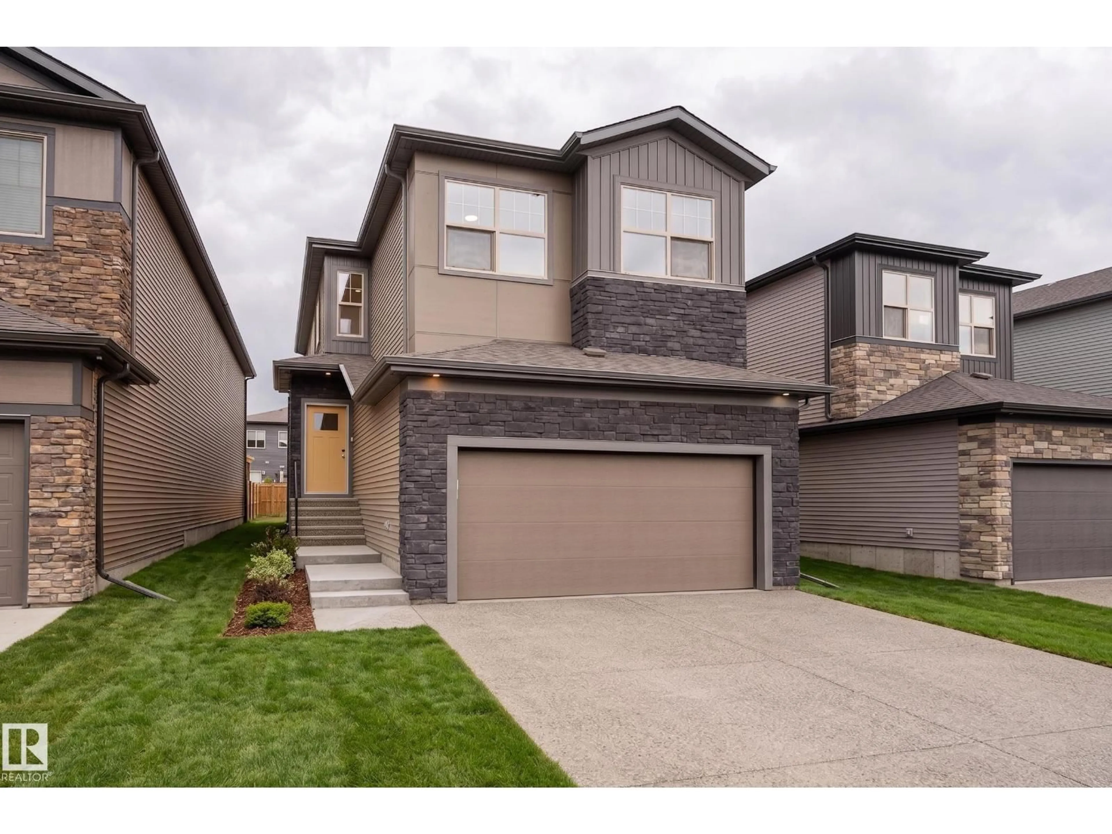 Home with brick exterior material, street for 115 GARNEAU GA, Spruce Grove Alberta T7X2Y6