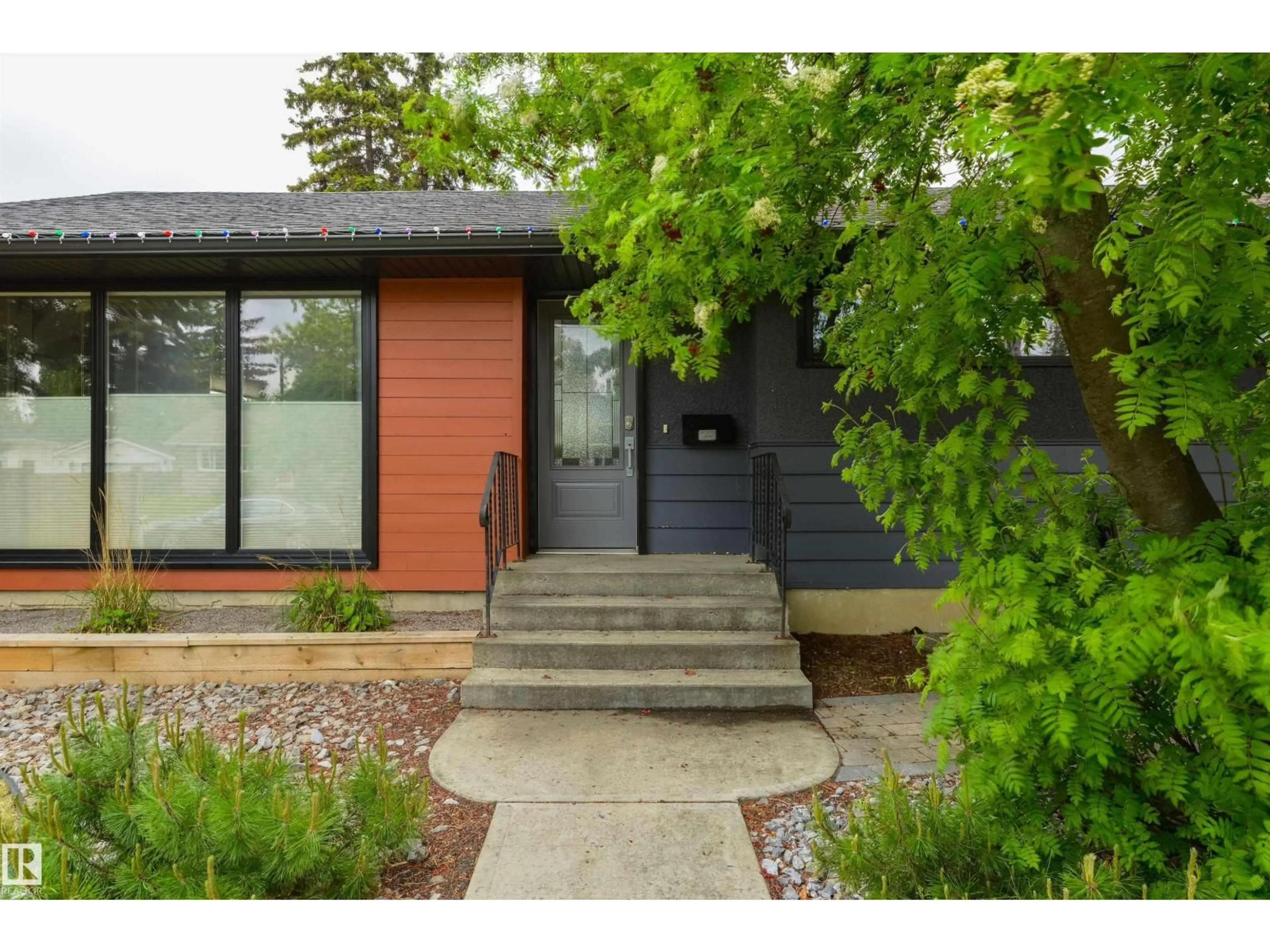 Home with brick exterior material, street for NW - 14307 86 AV, Edmonton Alberta T5R4B4