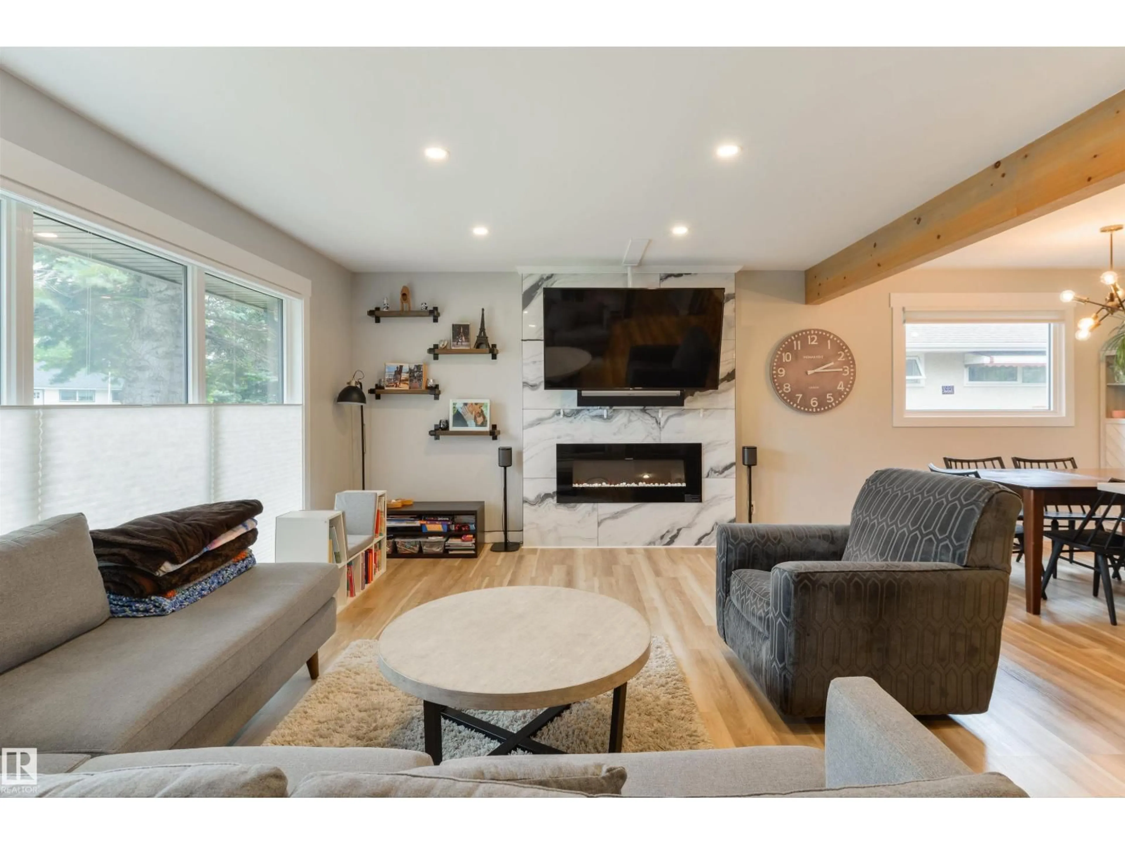 Living room with furniture, wood/laminate floor for NW - 14307 86 AV, Edmonton Alberta T5R4B4