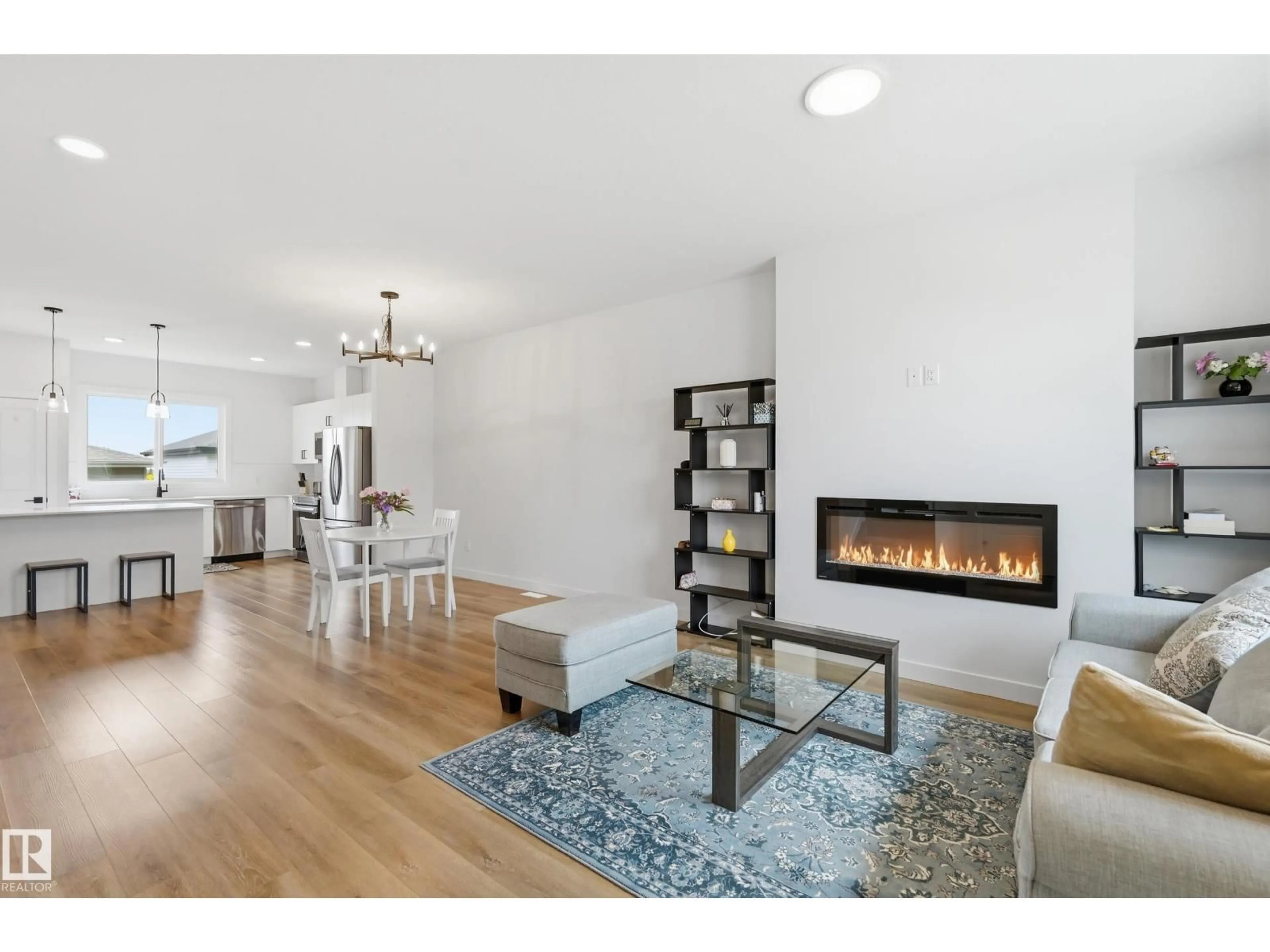 Living room with furniture, wood/laminate floor for 54 SIENNA BV, Fort Saskatchewan Alberta T8L0W3