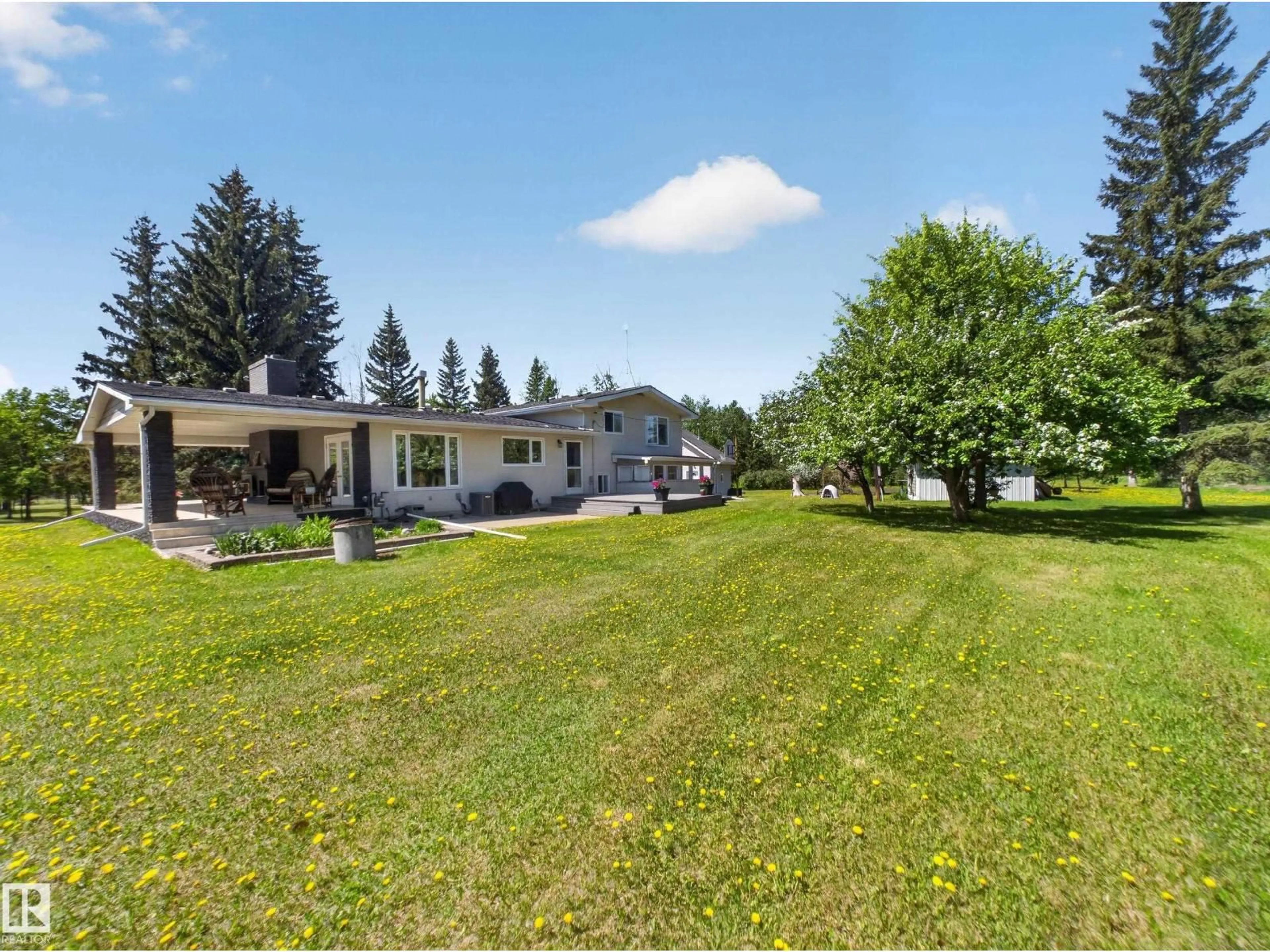 A pic from outside/outdoor area/front of a property/back of a property/a pic from drone, unknown for 22048 TWP ROAD 522, Rural Strathcona County Alberta T8E1G2