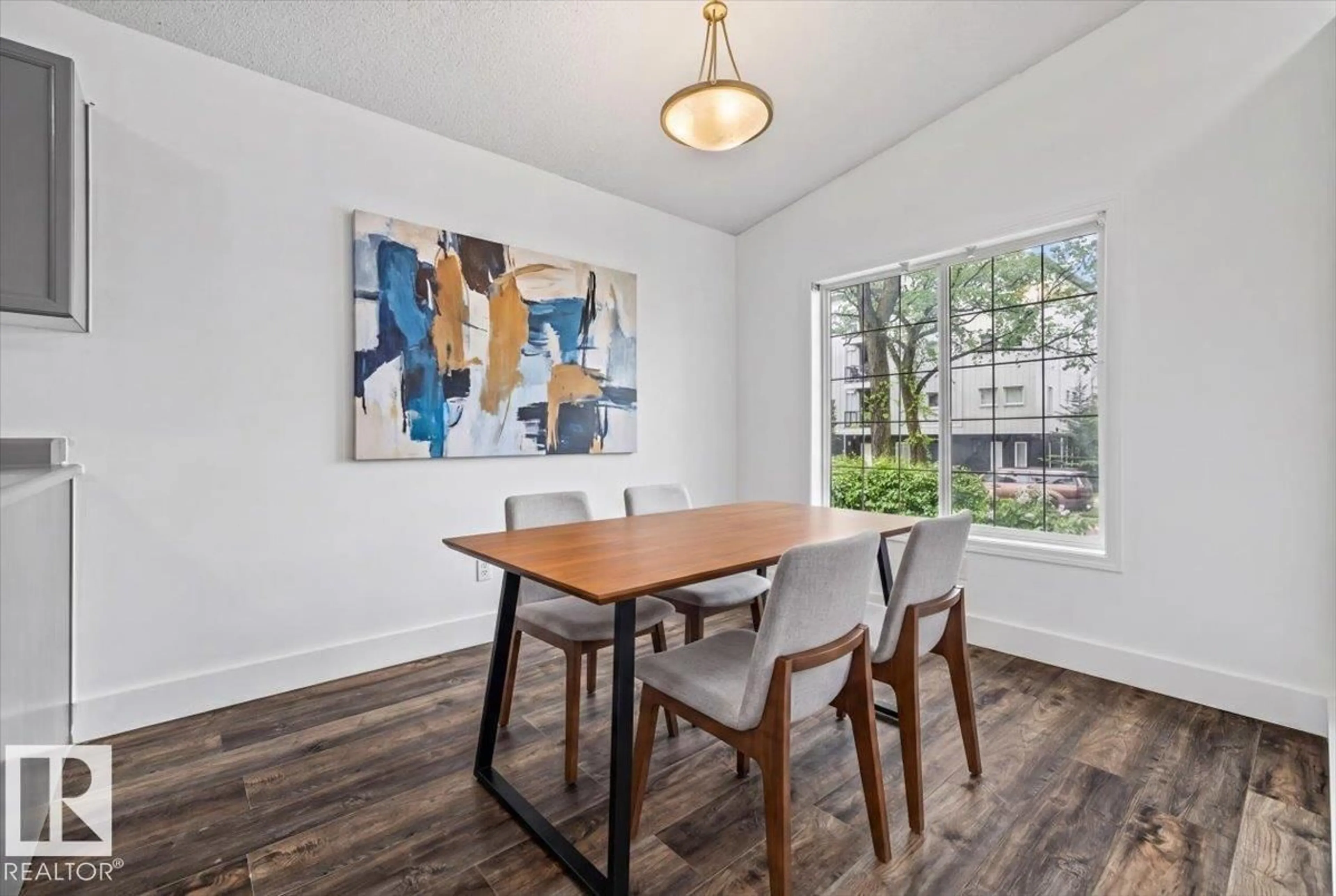 Dining room, wood/laminate floor for NW - 11229 85 ST, Edmonton Alberta T5B3C6