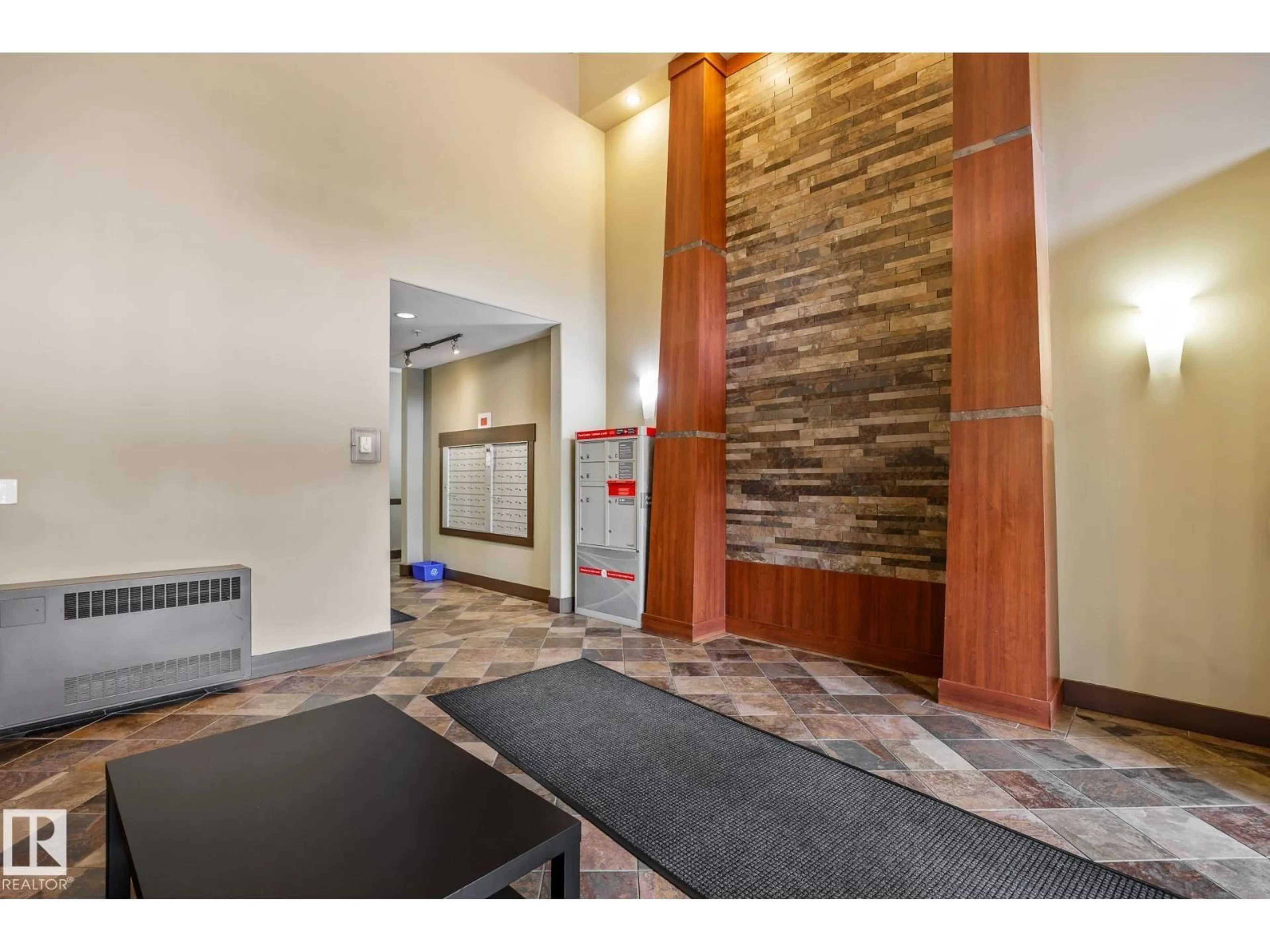 Indoor foyer for #217 - 2503 HANNA CR, Edmonton Alberta T6R0H1