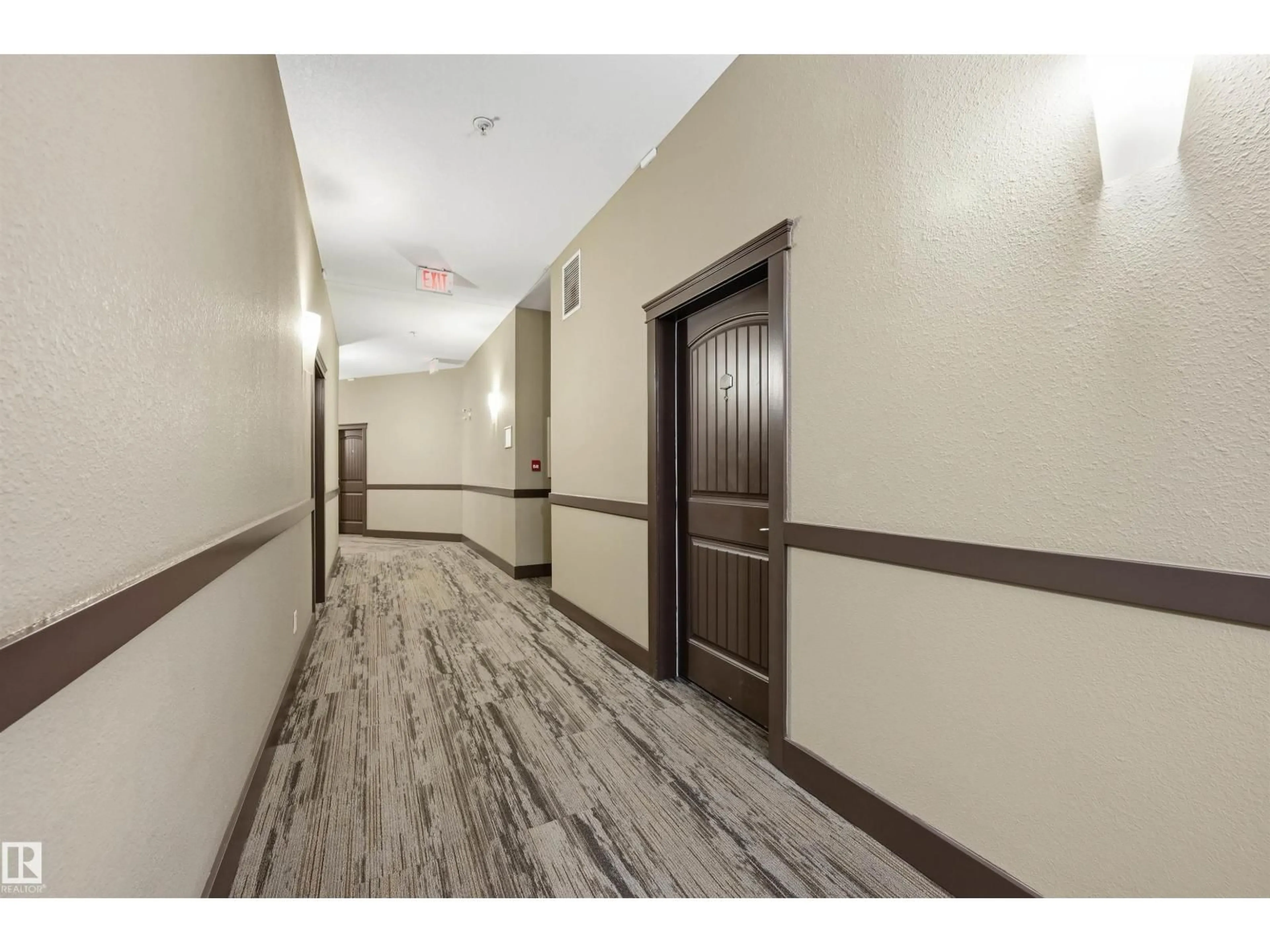 Indoor foyer for #217 - 2503 HANNA CR, Edmonton Alberta T6R0H1