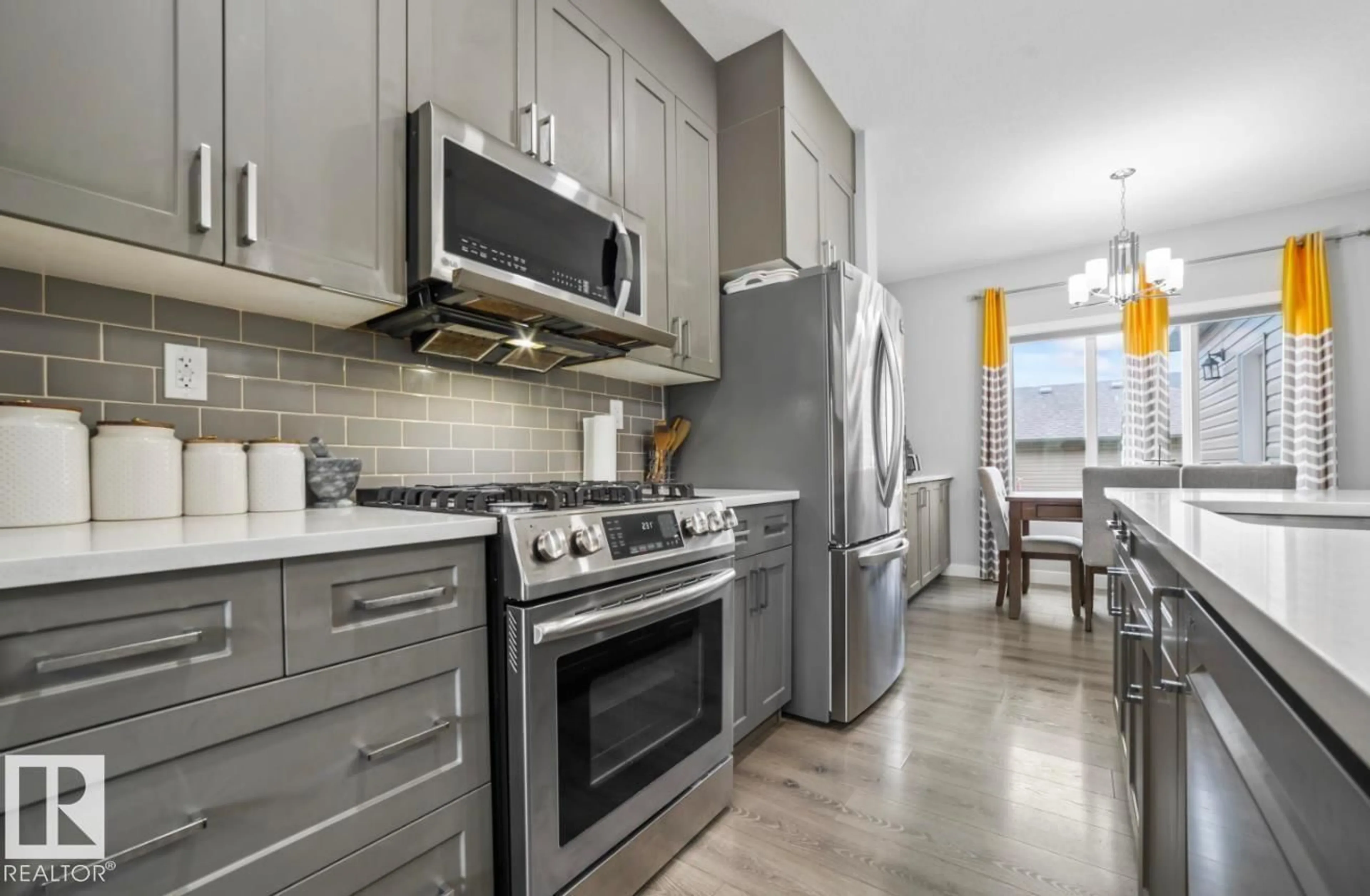 Open concept kitchen, ceramic/tile floor for 2153 MAPLE RD, Edmonton Alberta T6T2L4