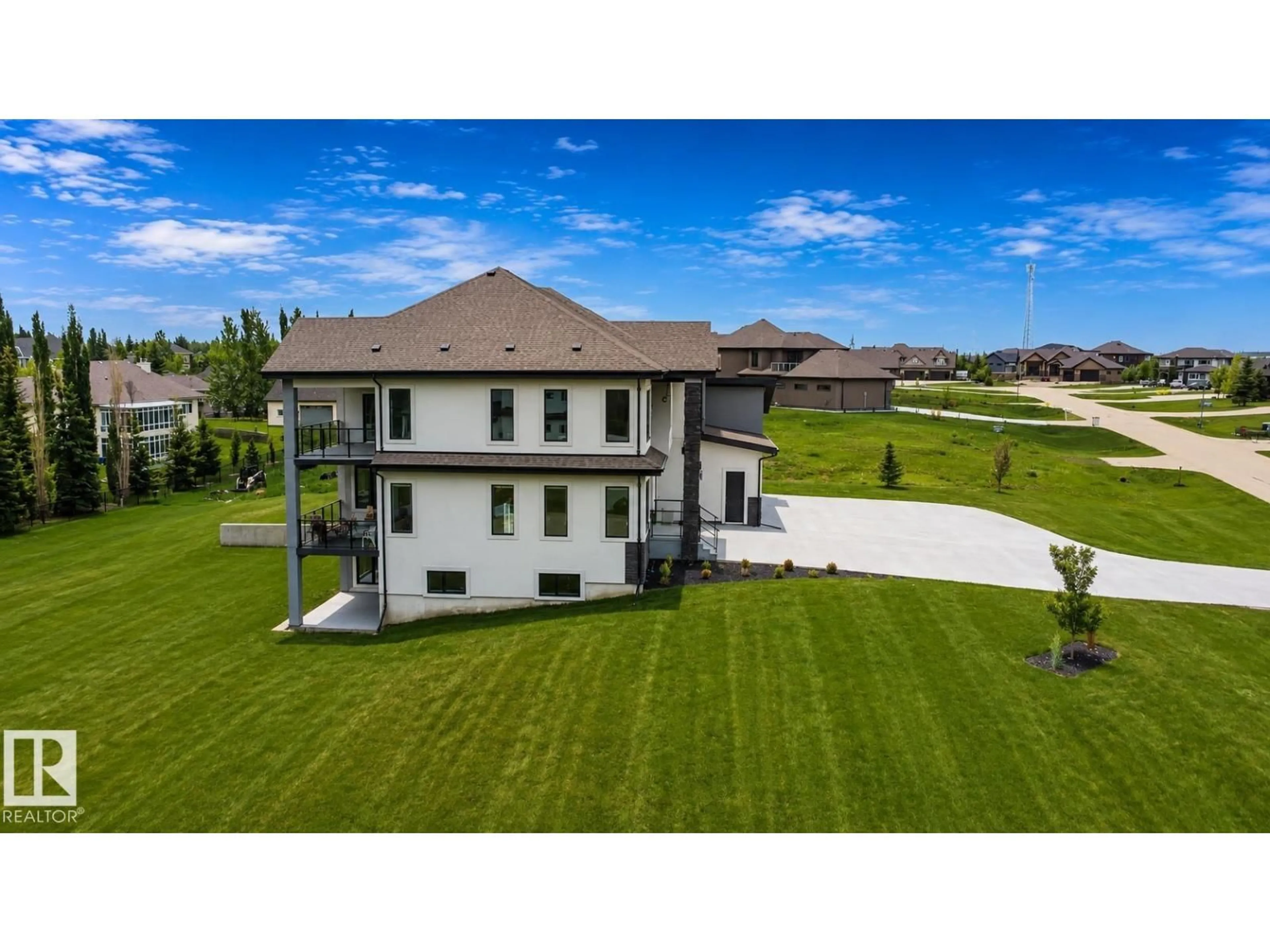 A pic from outside/outdoor area/front of a property/back of a property/a pic from drone, mountain view for #83 - 26131 TWP ROAD 532 A, Rural Parkland County Alberta T7Y1A1