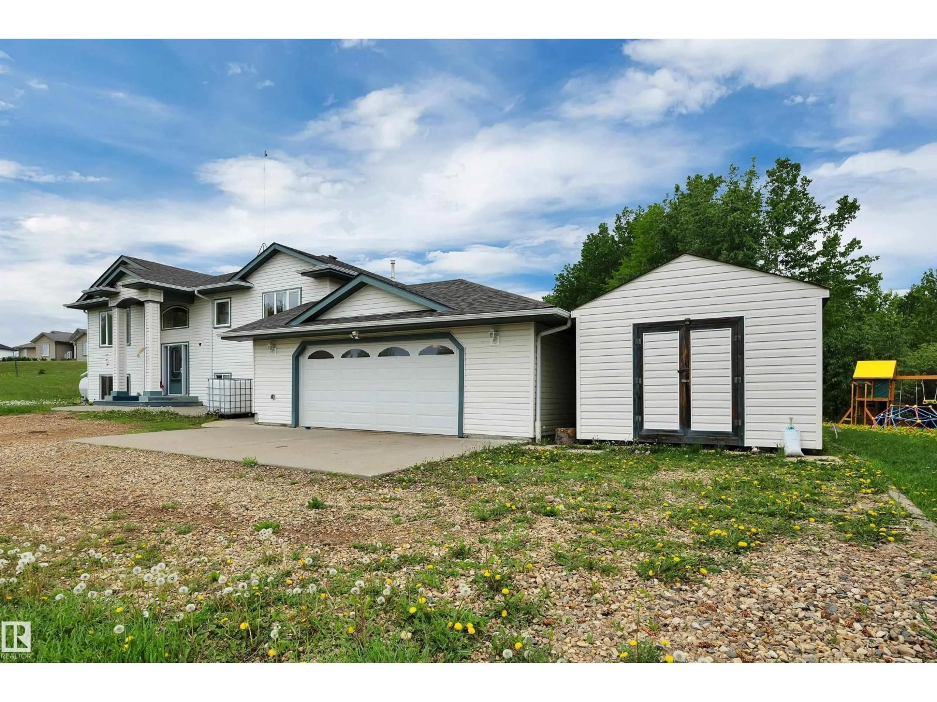 Home with vinyl exterior material, street for 60 20508 TOWNSHIP ROAD 502, Rural Beaver County Alberta T0B4J2