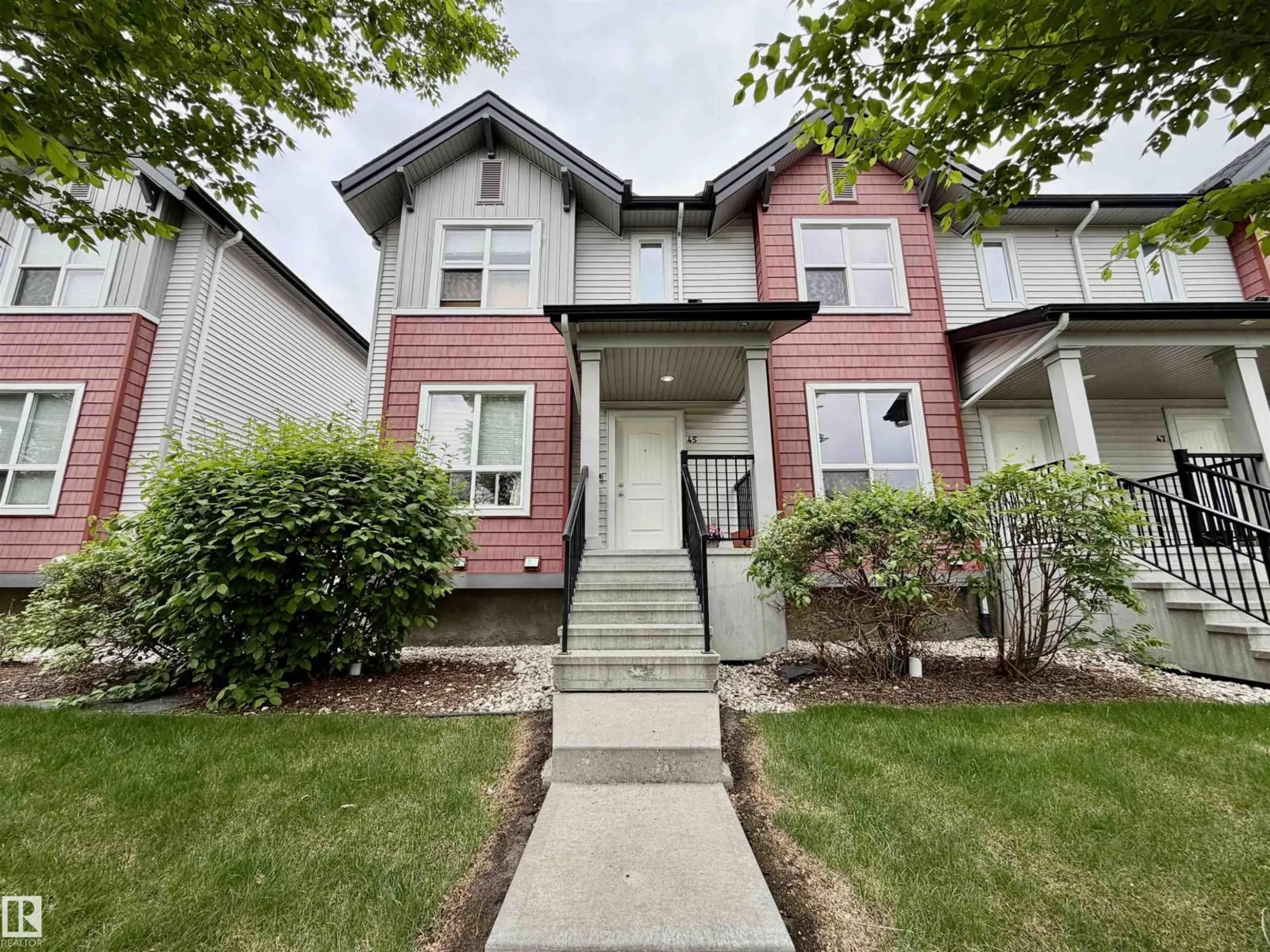 Home with vinyl exterior material, street for #45 - 6075 SCHONSEE WY, Edmonton Alberta T5Z0H4