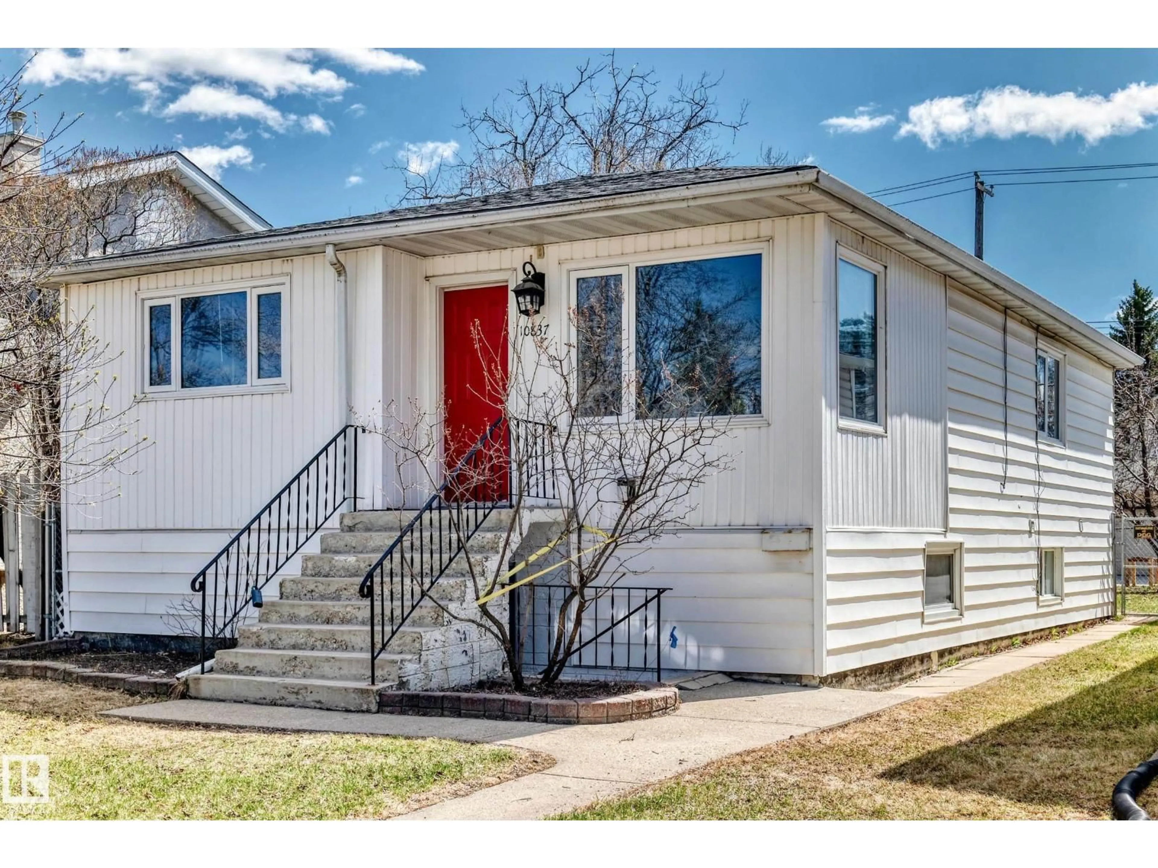 Home with vinyl exterior material, street for 10837 65 AV, Edmonton Alberta T6H1V8