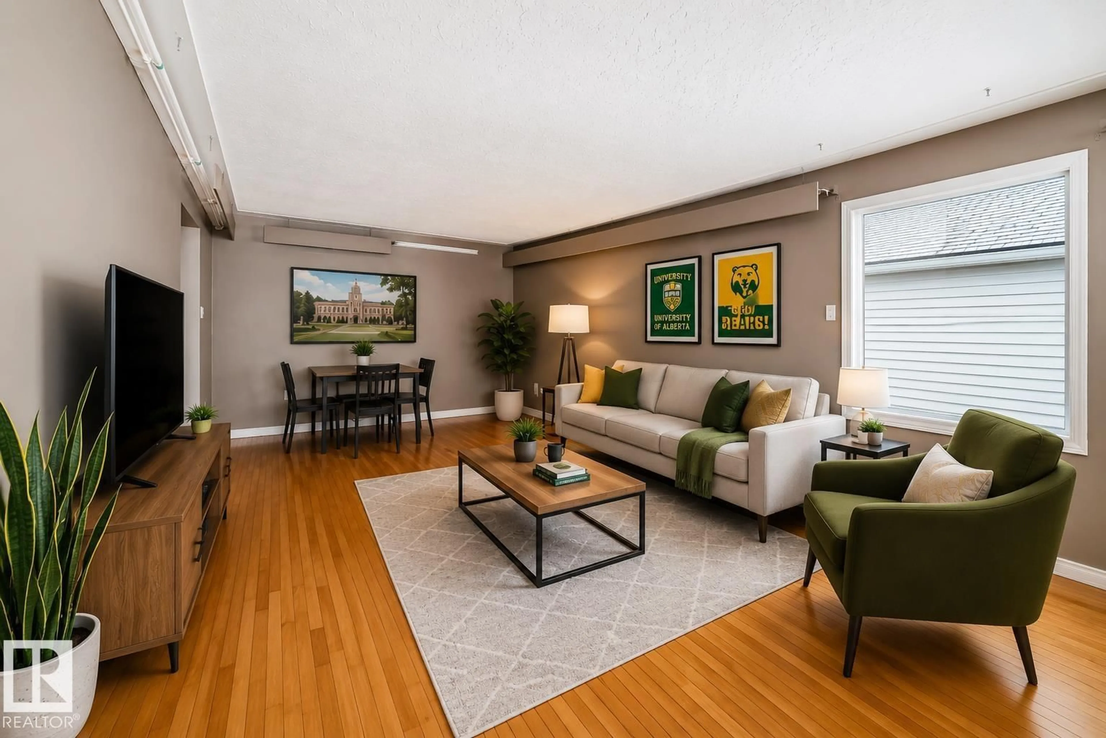 Living room with furniture, wood/laminate floor for 10837 65 AV, Edmonton Alberta T6H1V8
