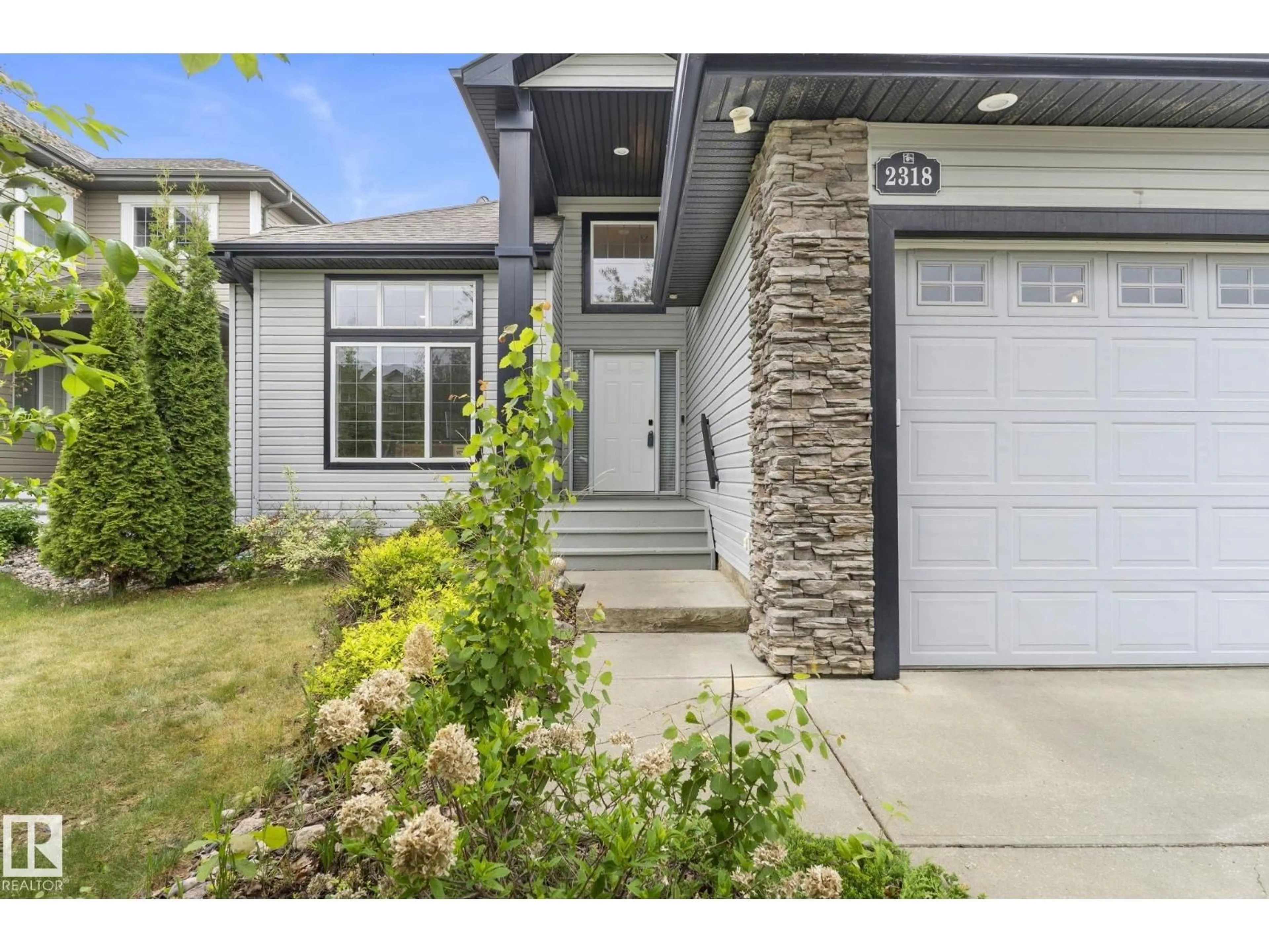 Home with vinyl exterior material, street for 2318 RUTHERFORD WY, Edmonton Alberta T6W1P4