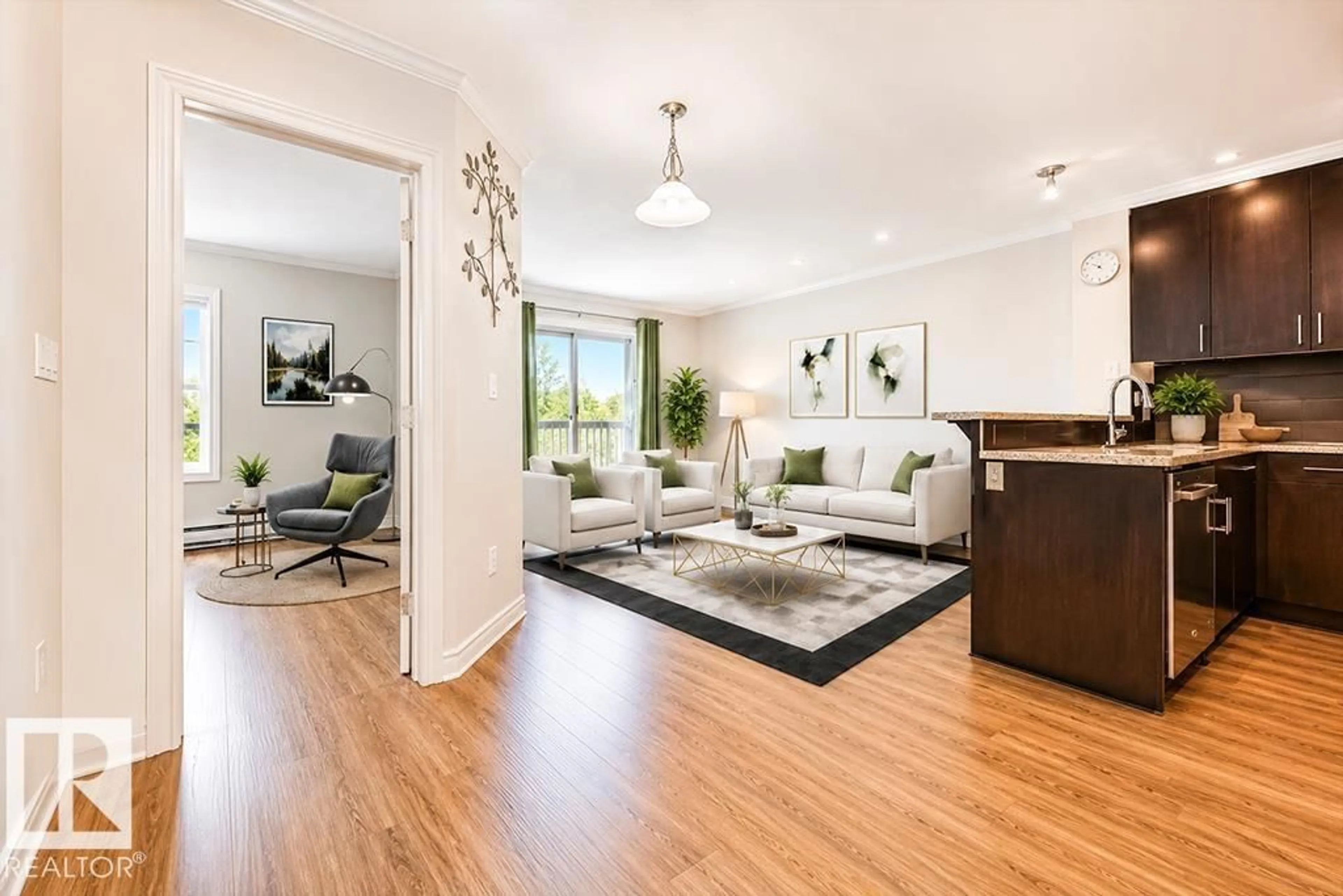 Living room with furniture, wood/laminate floor for 411 - 2204 44 AV NW, Edmonton Alberta T6T0G5