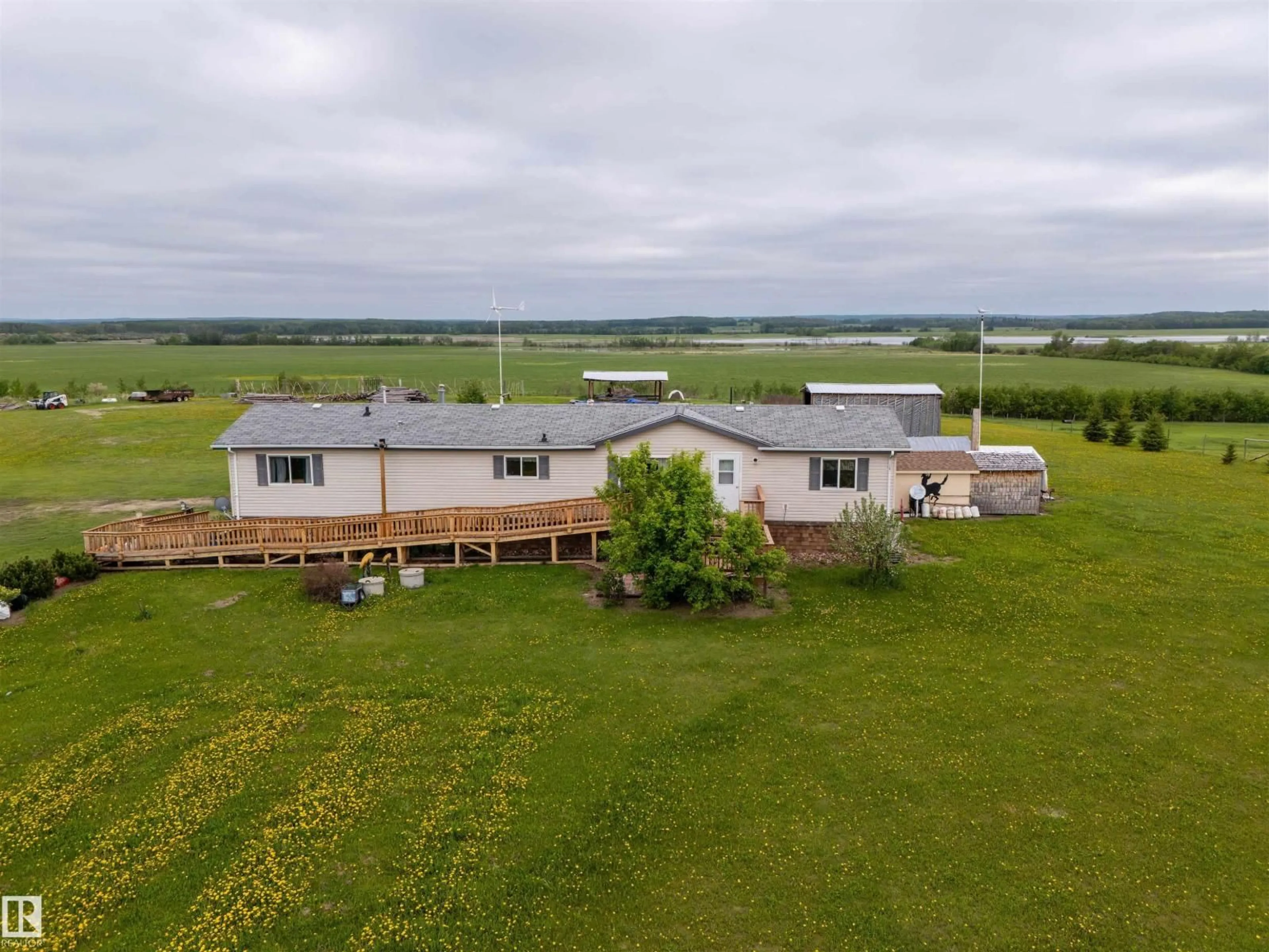 A pic from outside/outdoor area/front of a property/back of a property/a pic from drone, building for 43313 TWP RD 615A, Rural Bonnyville M.D. Alberta T9M1P3