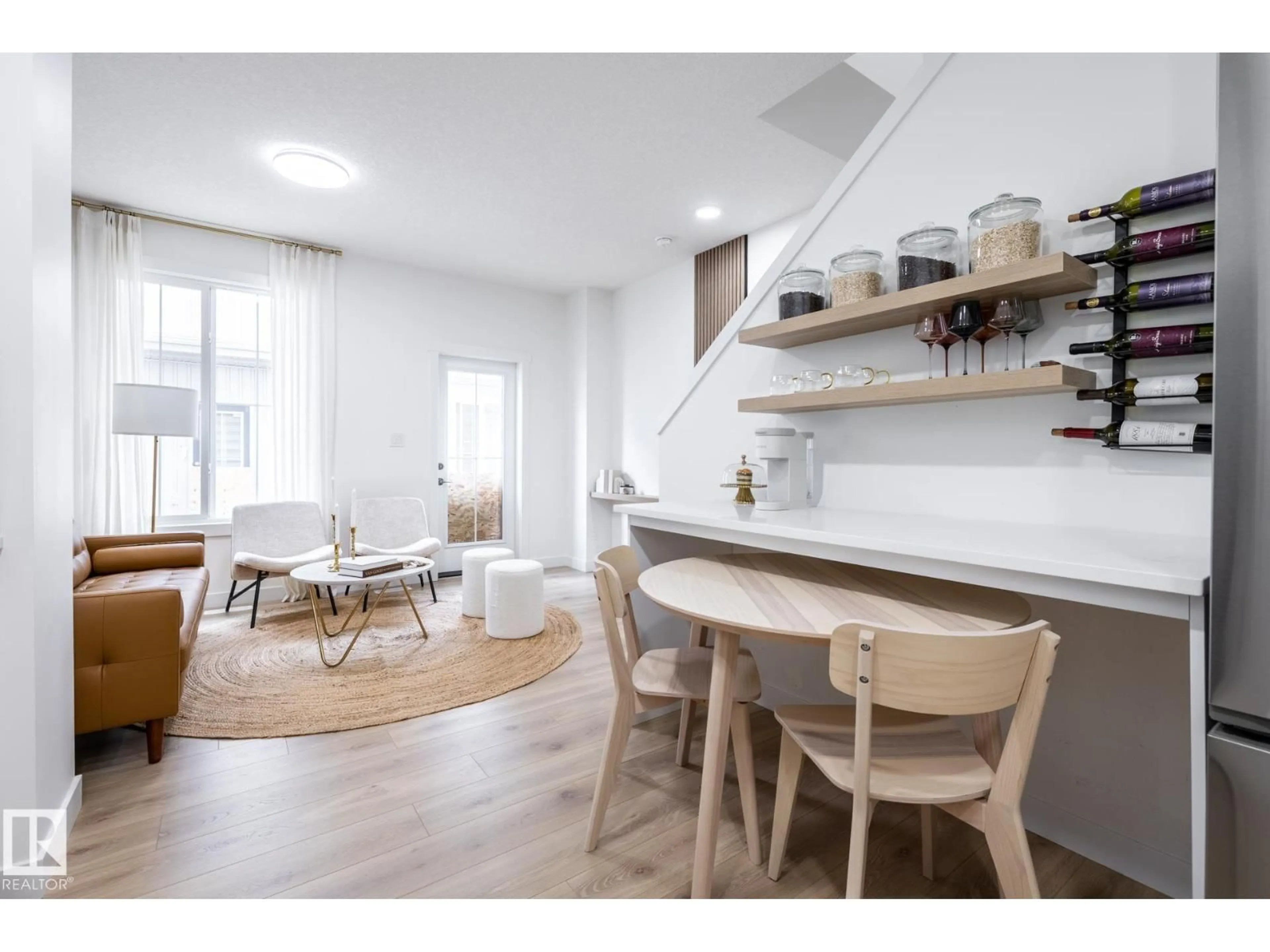 Open concept kitchen, wood/laminate floor for 55 - 7020 KESWICK CM, Edmonton Alberta T6W5P8