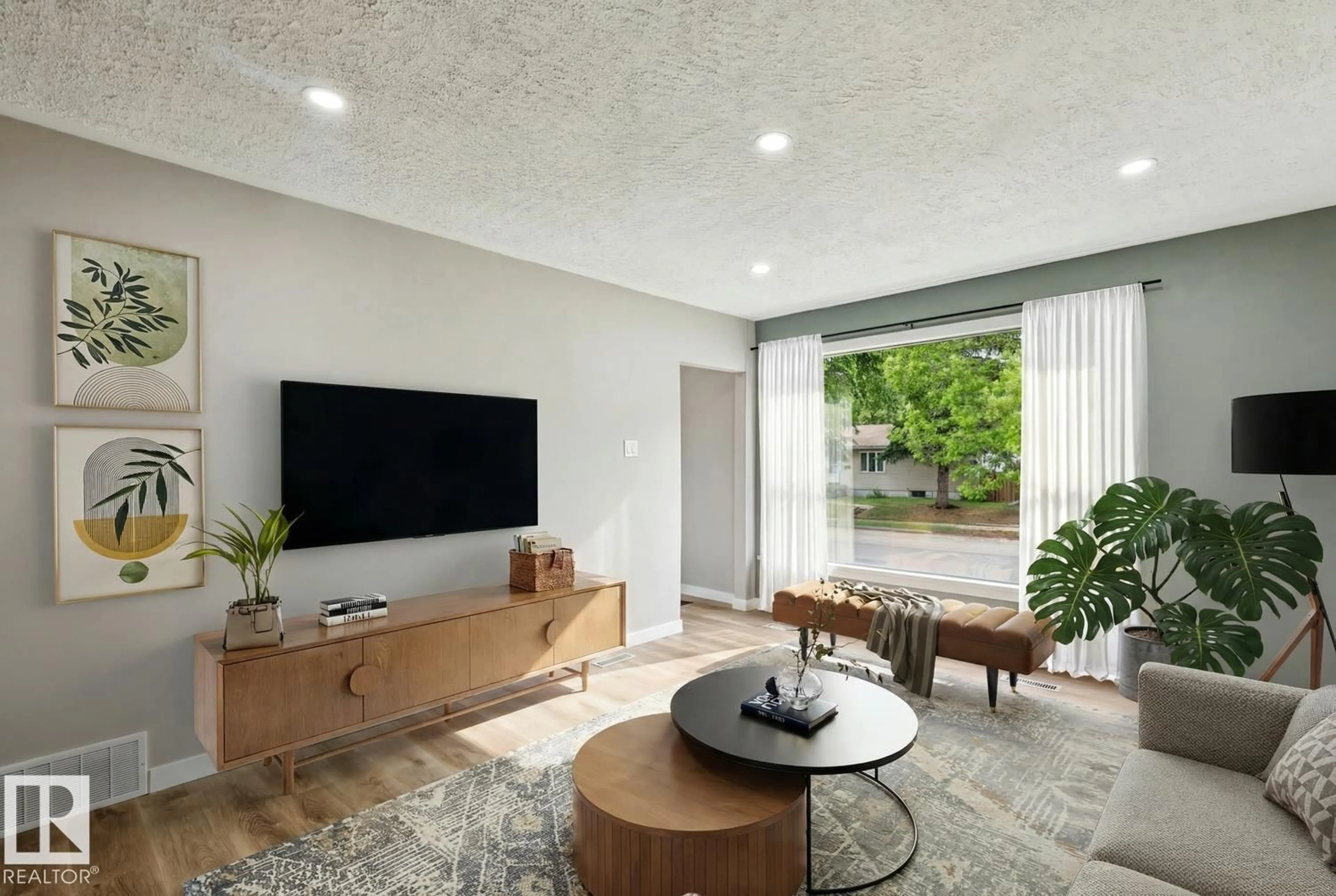 Living room with furniture, unknown for 4037 114 AV, Edmonton Alberta T5W0S9