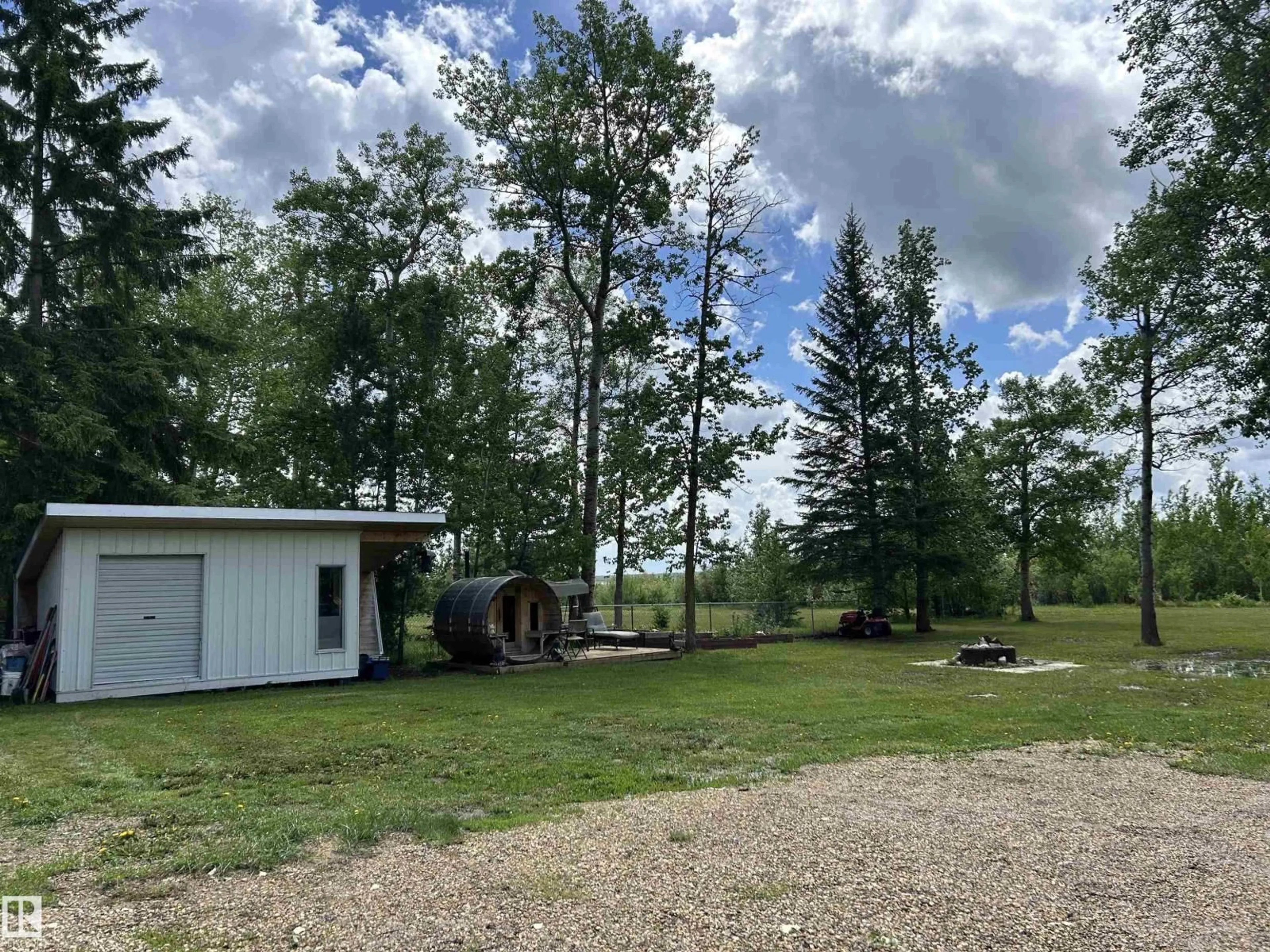 A pic from outside/outdoor area/front of a property/back of a property/a pic from drone, forest/trees view for 177 - 51551 RANGE ROAD 212A, Rural Strathcona County Alberta T8G1B2