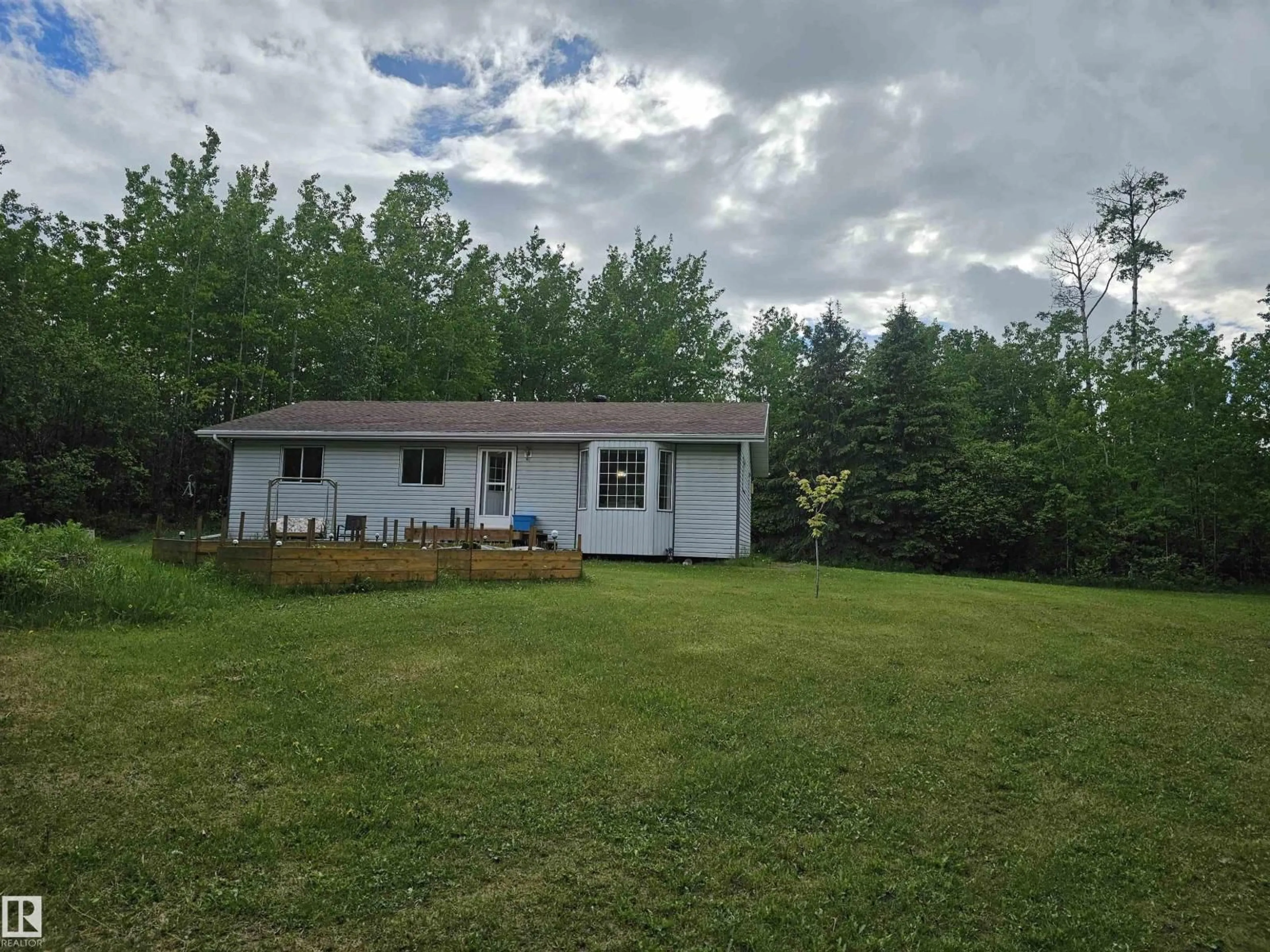 A pic from outside/outdoor area/front of a property/back of a property/a pic from drone, unknown for 13 - 54222 RGE ROAD 25, Rural Lac Ste. Anne County Alberta T0E1A0