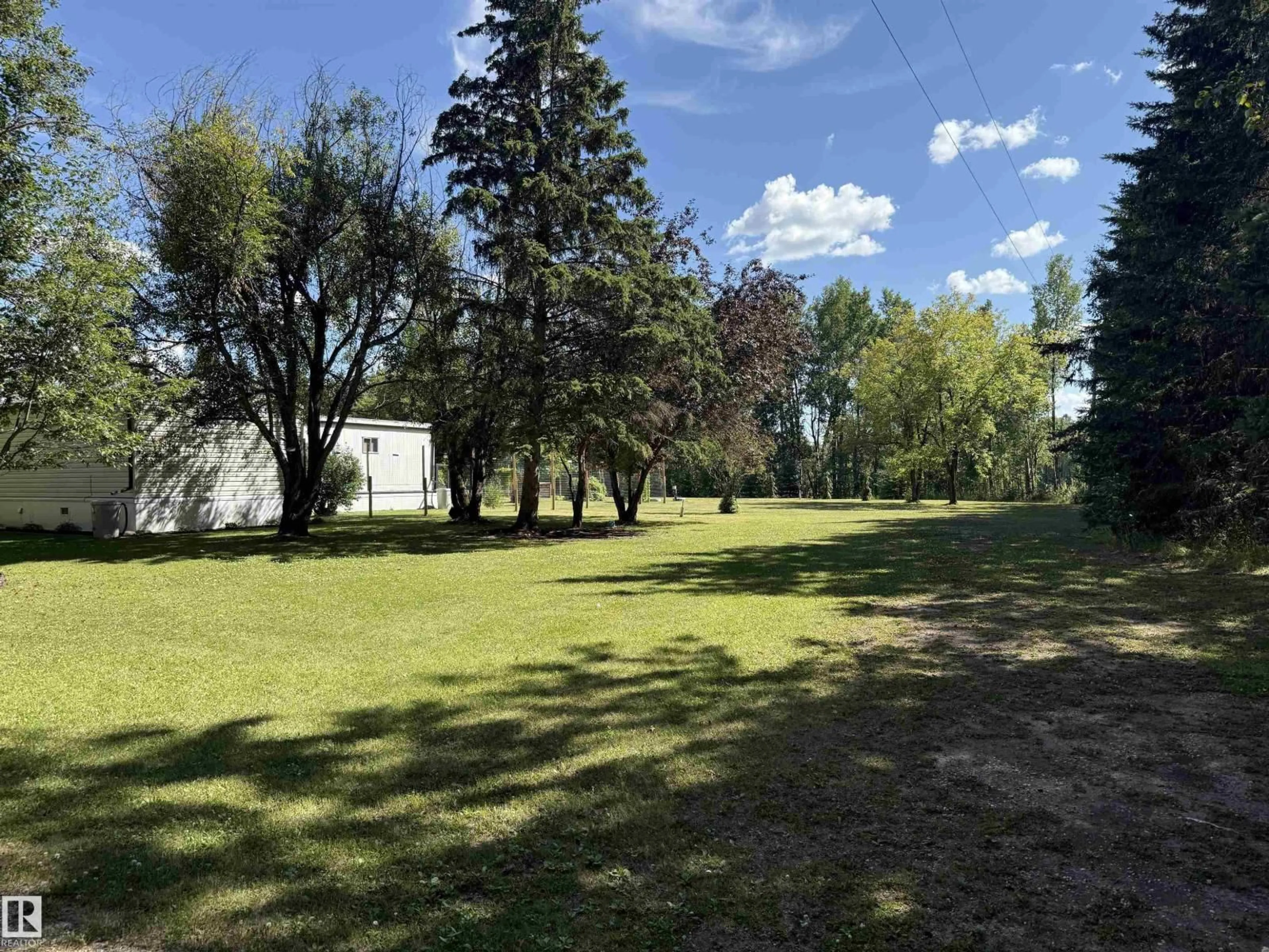A pic from outside/outdoor area/front of a property/back of a property/a pic from drone, forest/trees view for 623005 RR 60, Rural Woodlands County Alberta T0G1A0