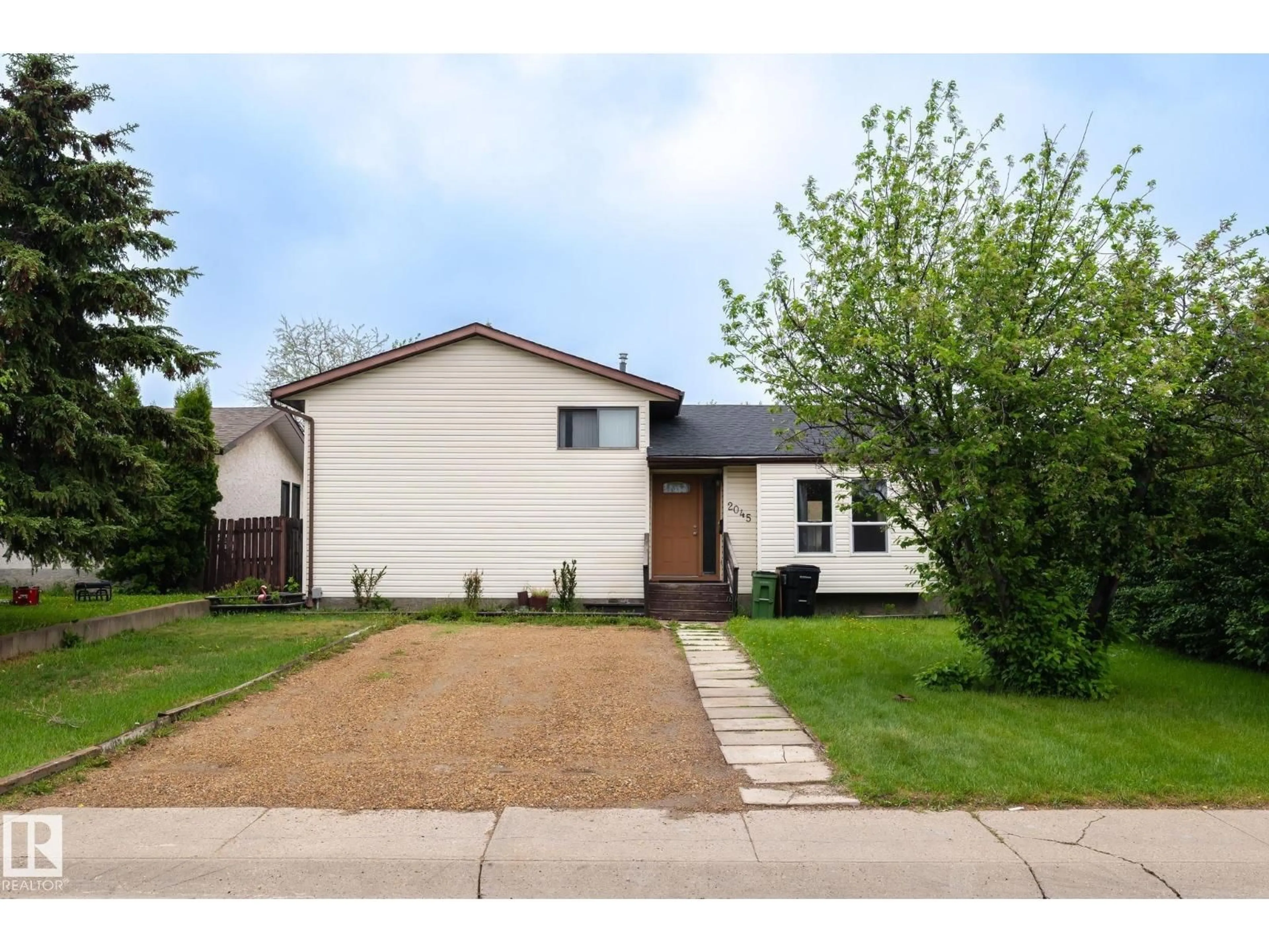 Home with vinyl exterior material, street for 2045 46 ST, Edmonton Alberta T6L2T6