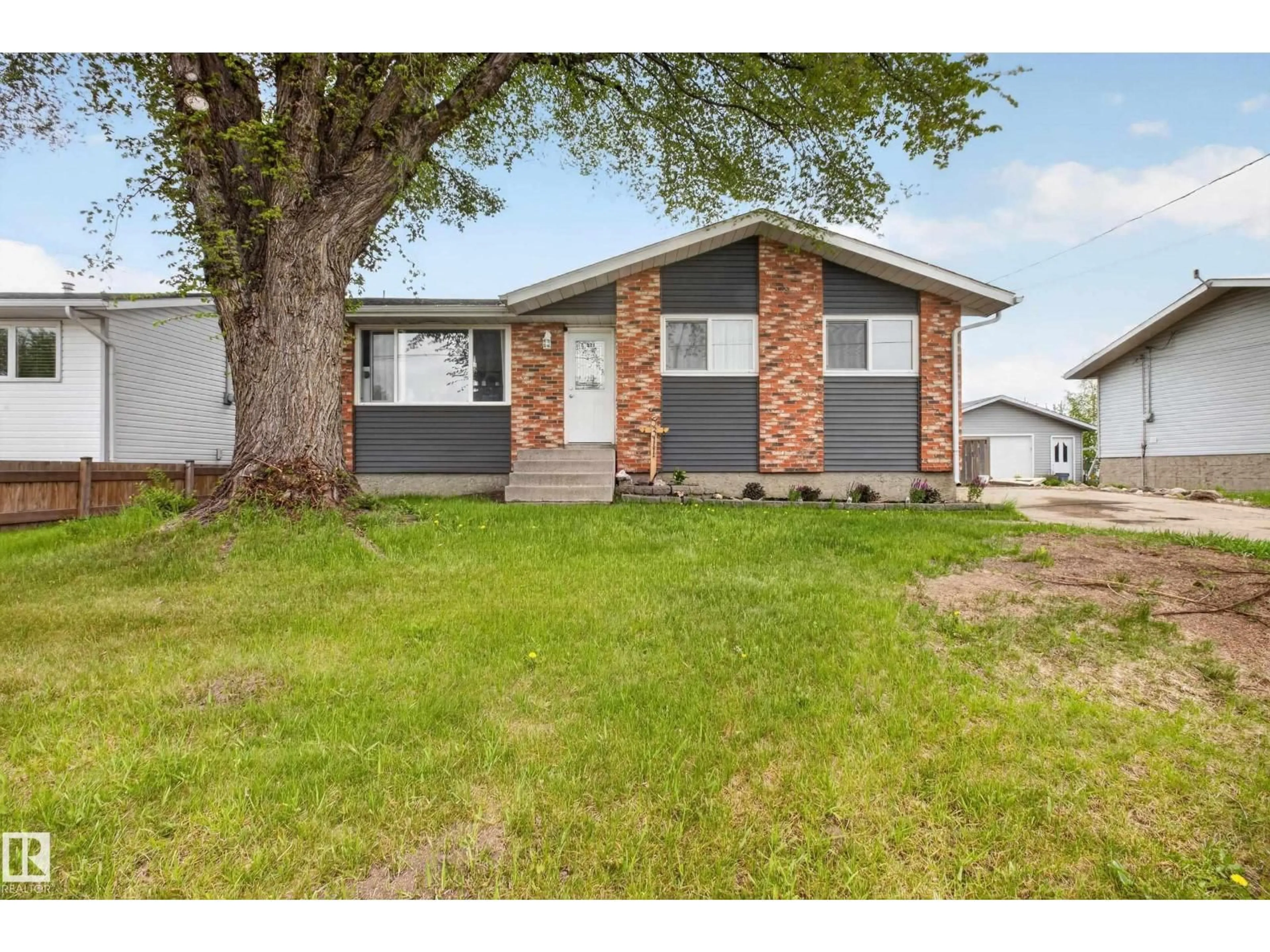 Home with vinyl exterior material, street for 5311 50 ST, Legal Alberta T0B1L0
