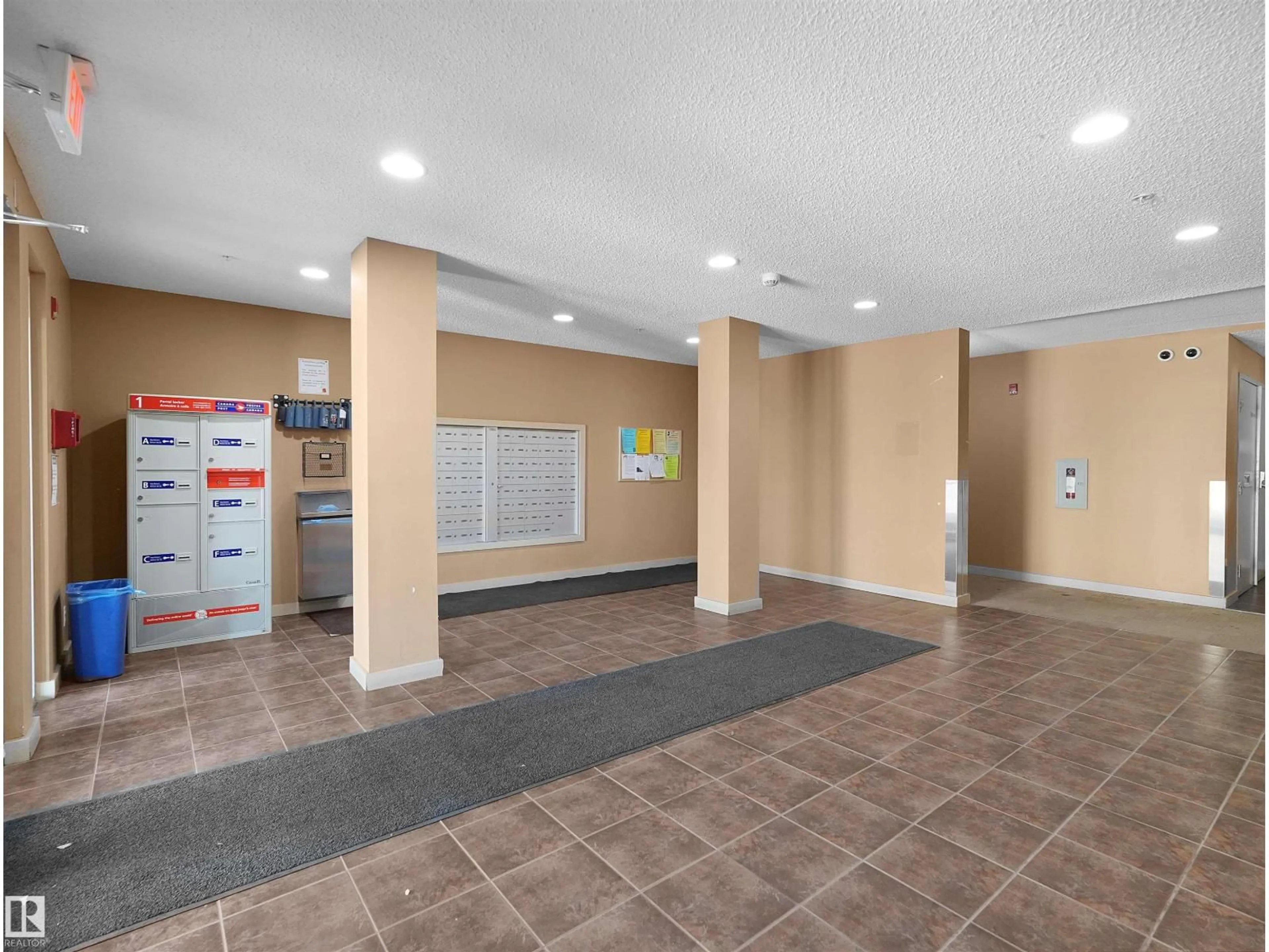 Indoor foyer for #115 - 12035 22 AV, Edmonton Alberta T6W2X9