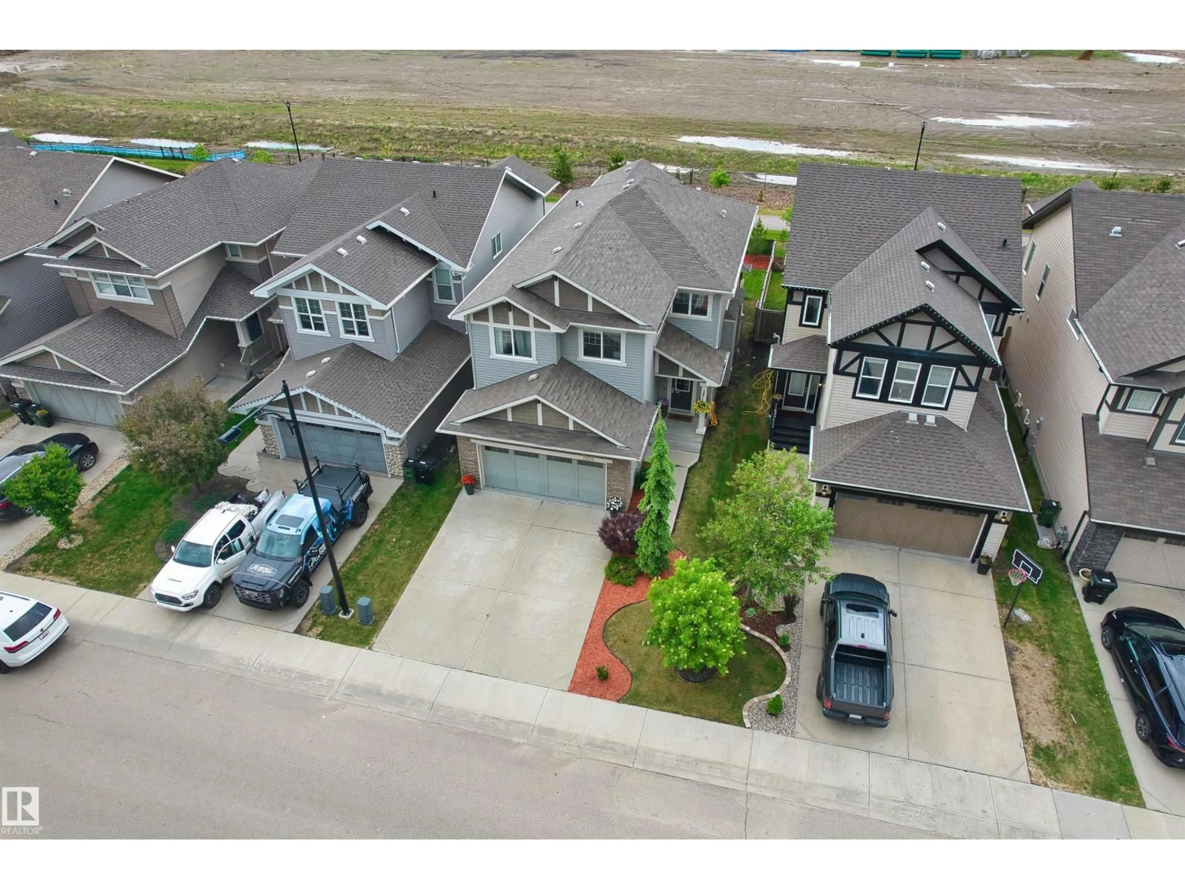 A pic from outside/outdoor area/front of a property/back of a property/a pic from drone, street for SW - 3035 CARPENTER LANDING LD, Edmonton Alberta T6W2Z1