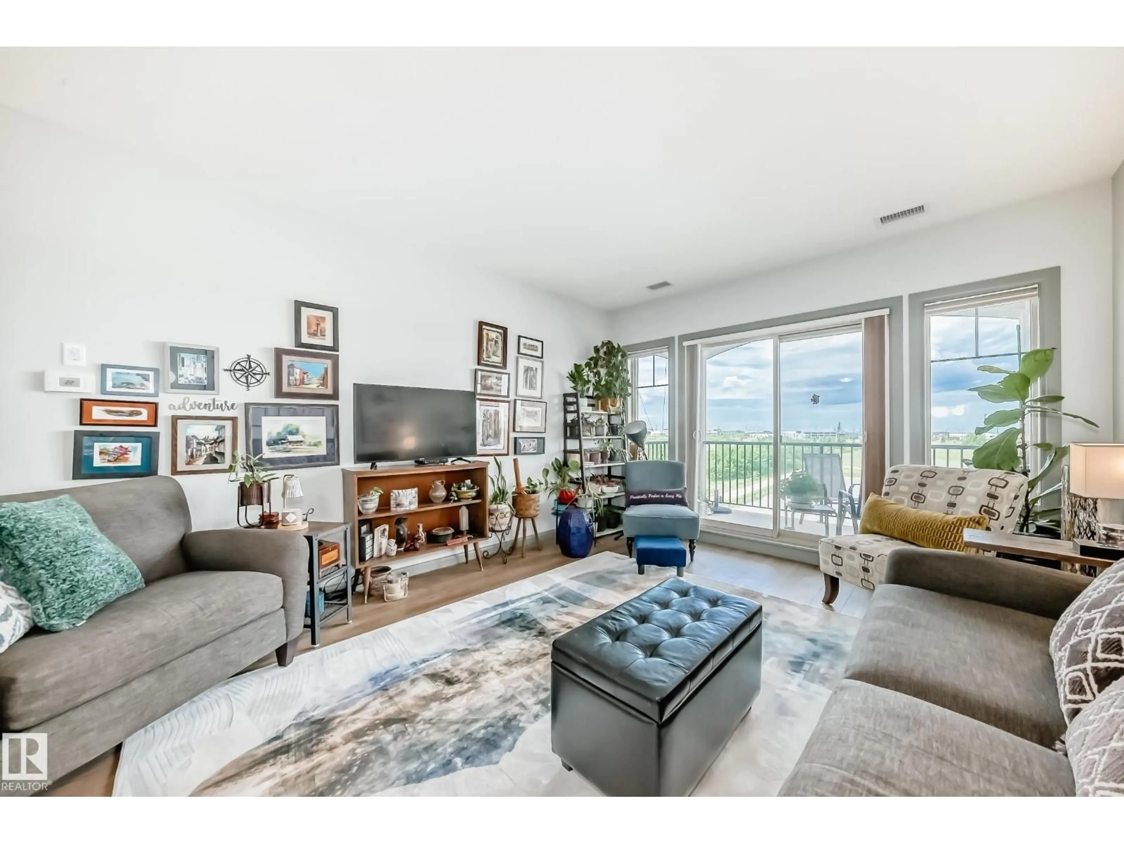 Living room with furniture, unknown for 400 - 418 PALISADES WY, Sherwood Park Alberta T8H0H4