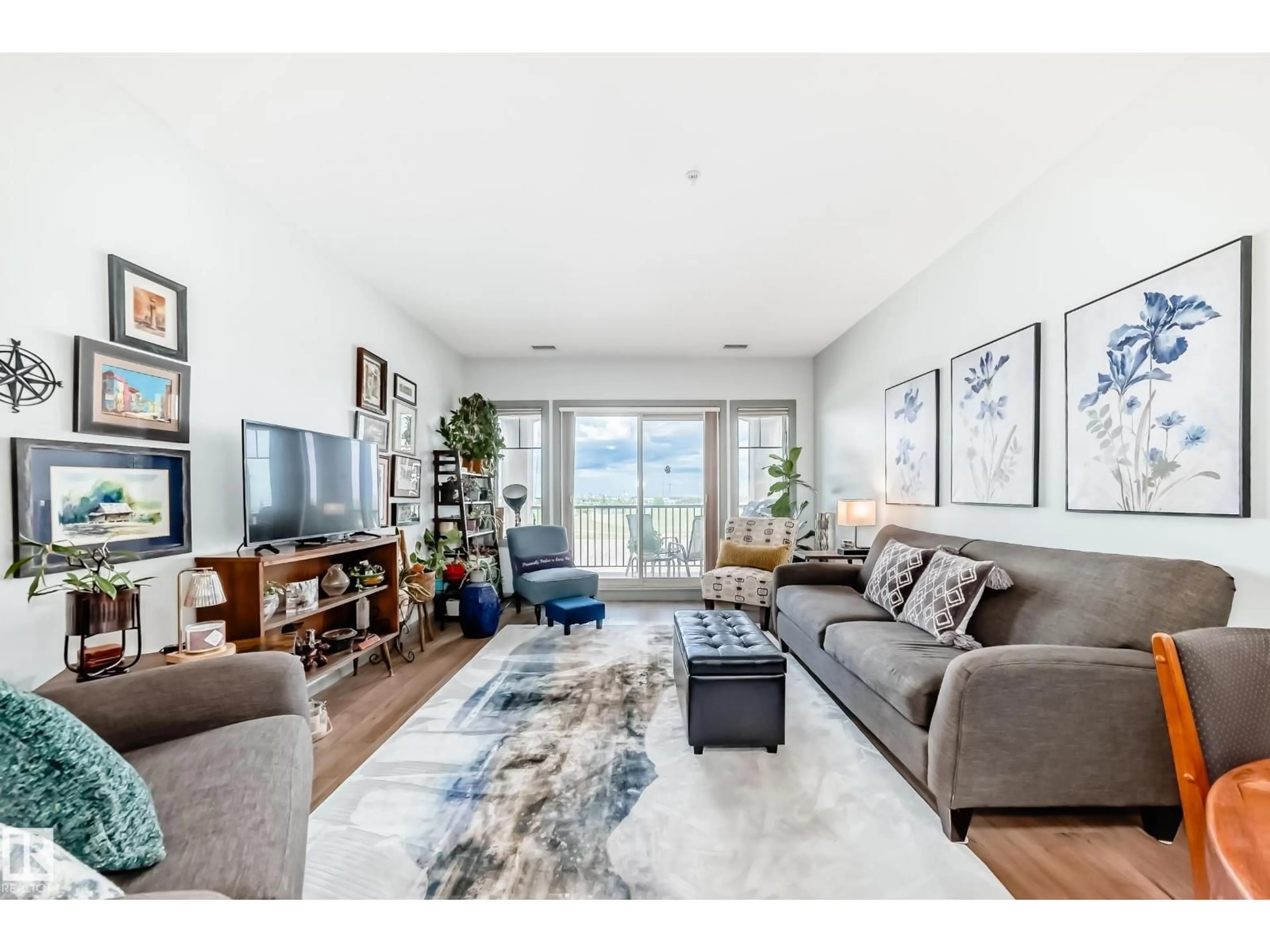 Living room with furniture, unknown for 400 - 418 PALISADES WY, Sherwood Park Alberta T8H0H4
