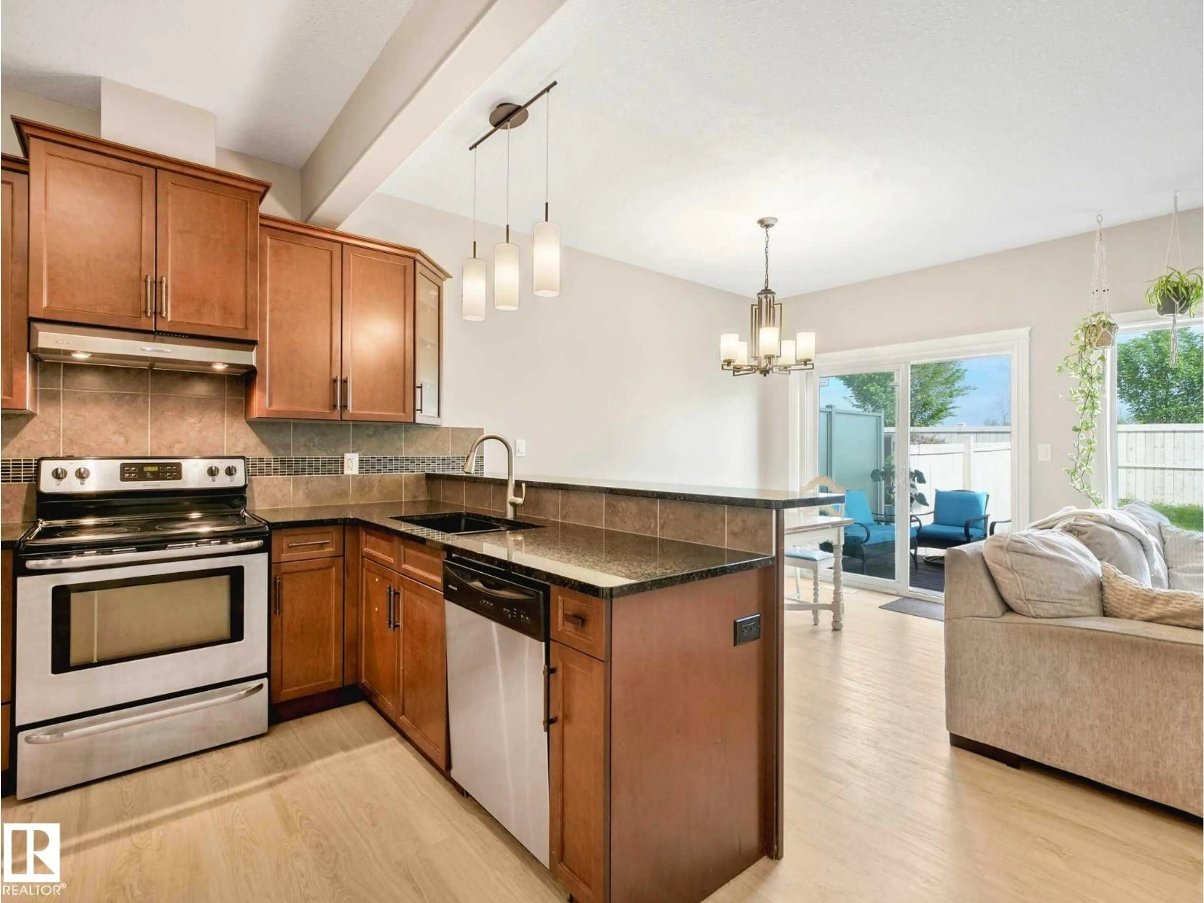 Open concept kitchen, ceramic/tile floor for SW - 16124 10 AV, Edmonton Alberta T6W2G9
