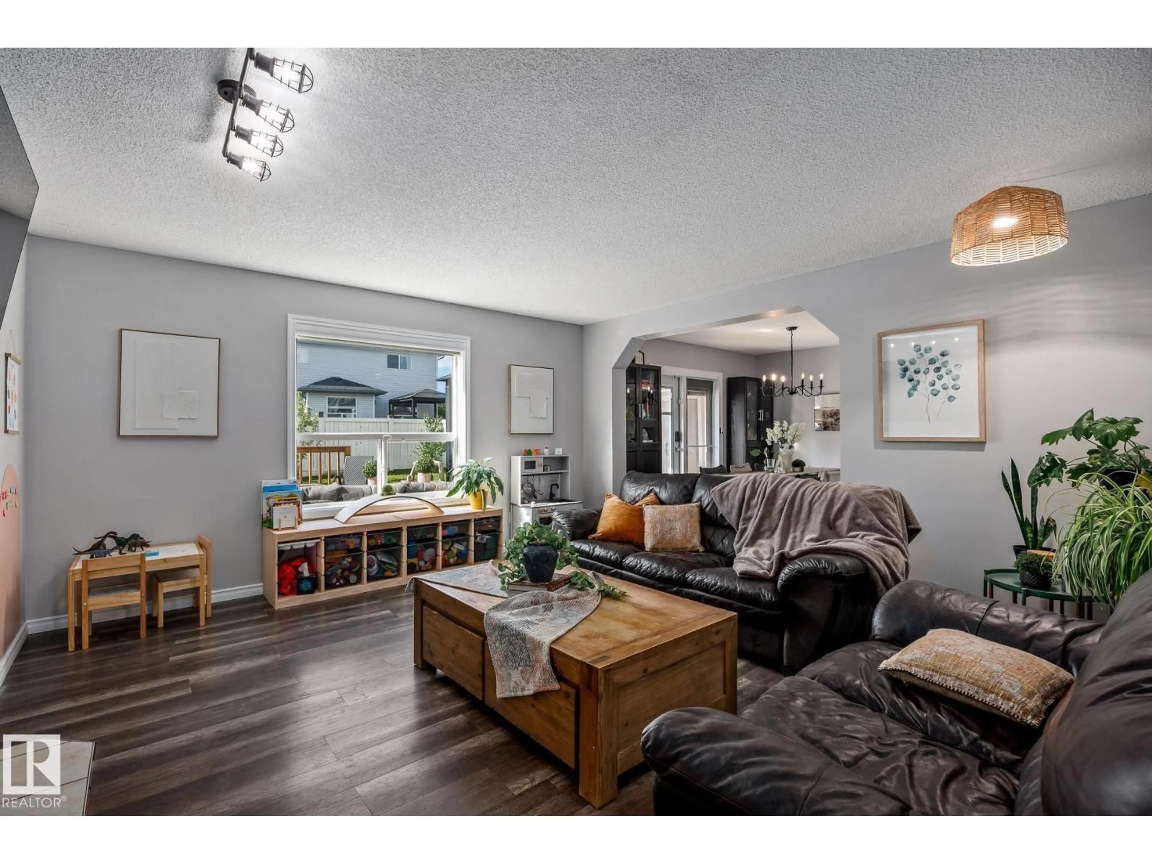 Living room with furniture, wood/laminate floor for 30 CROCUS CR, Sherwood Park Alberta T8H2J9