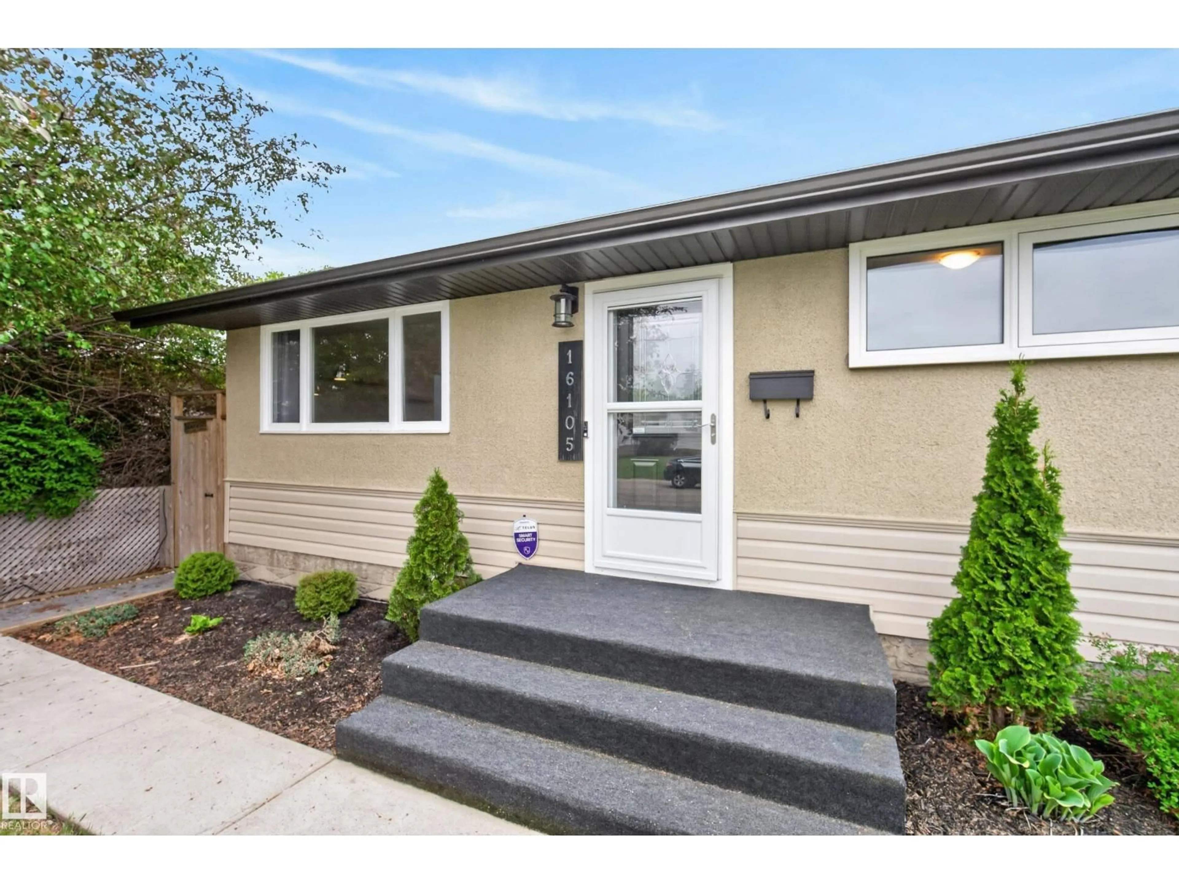 Home with vinyl exterior material, street for 16105 109A AV AV, Edmonton Alberta T5P1C5