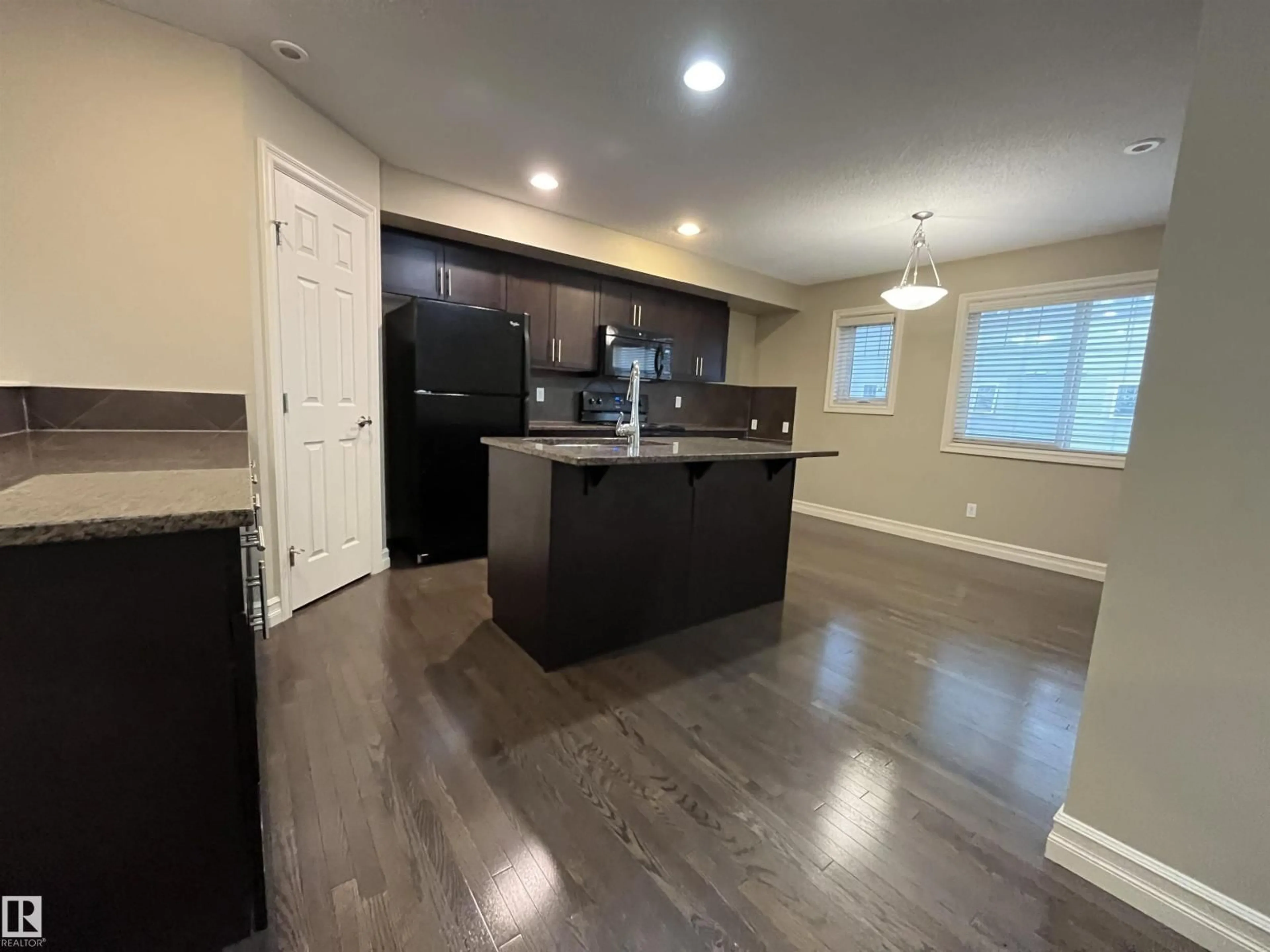 Open concept kitchen, unknown for #112 - 2336 ASPEN TR, Sherwood Park Alberta T8H0J1