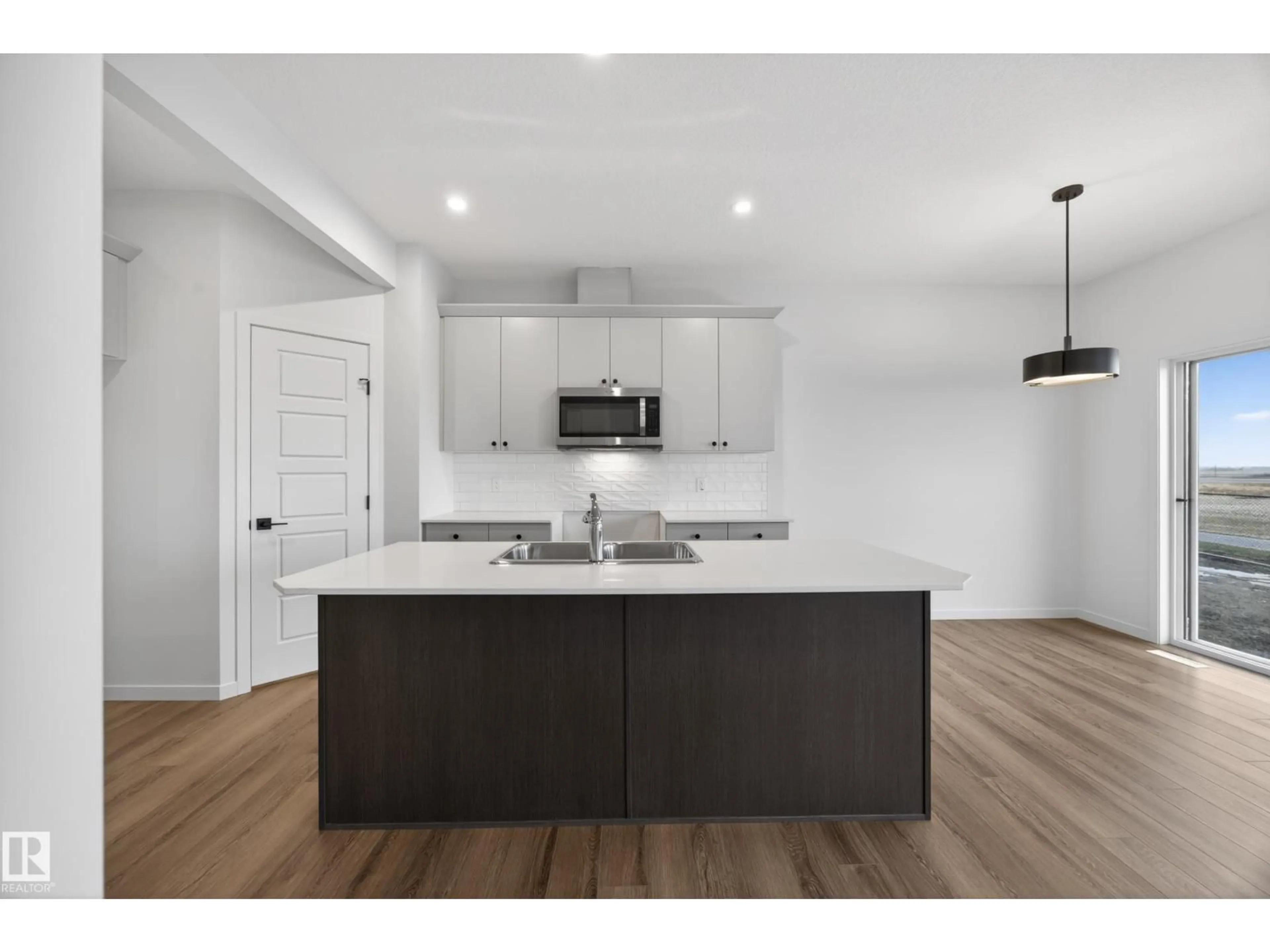Open concept kitchen, unknown for 116 HONEYSUCKLE GR, Leduc Alberta T9E0V1