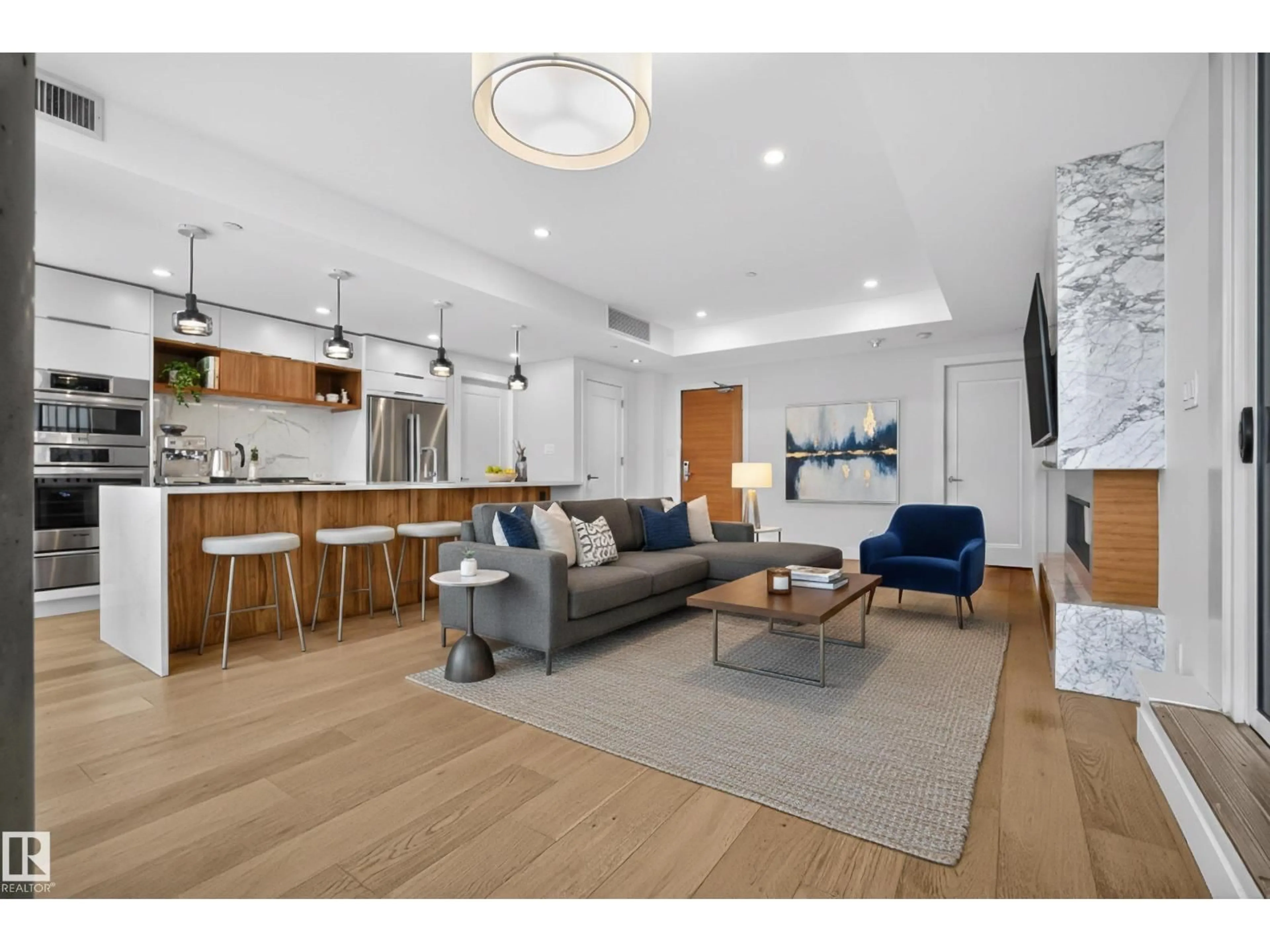 Living room with furniture, wood/laminate floor for 612 14105 WEST BLOCK DR, Edmonton Alberta T5N1L5