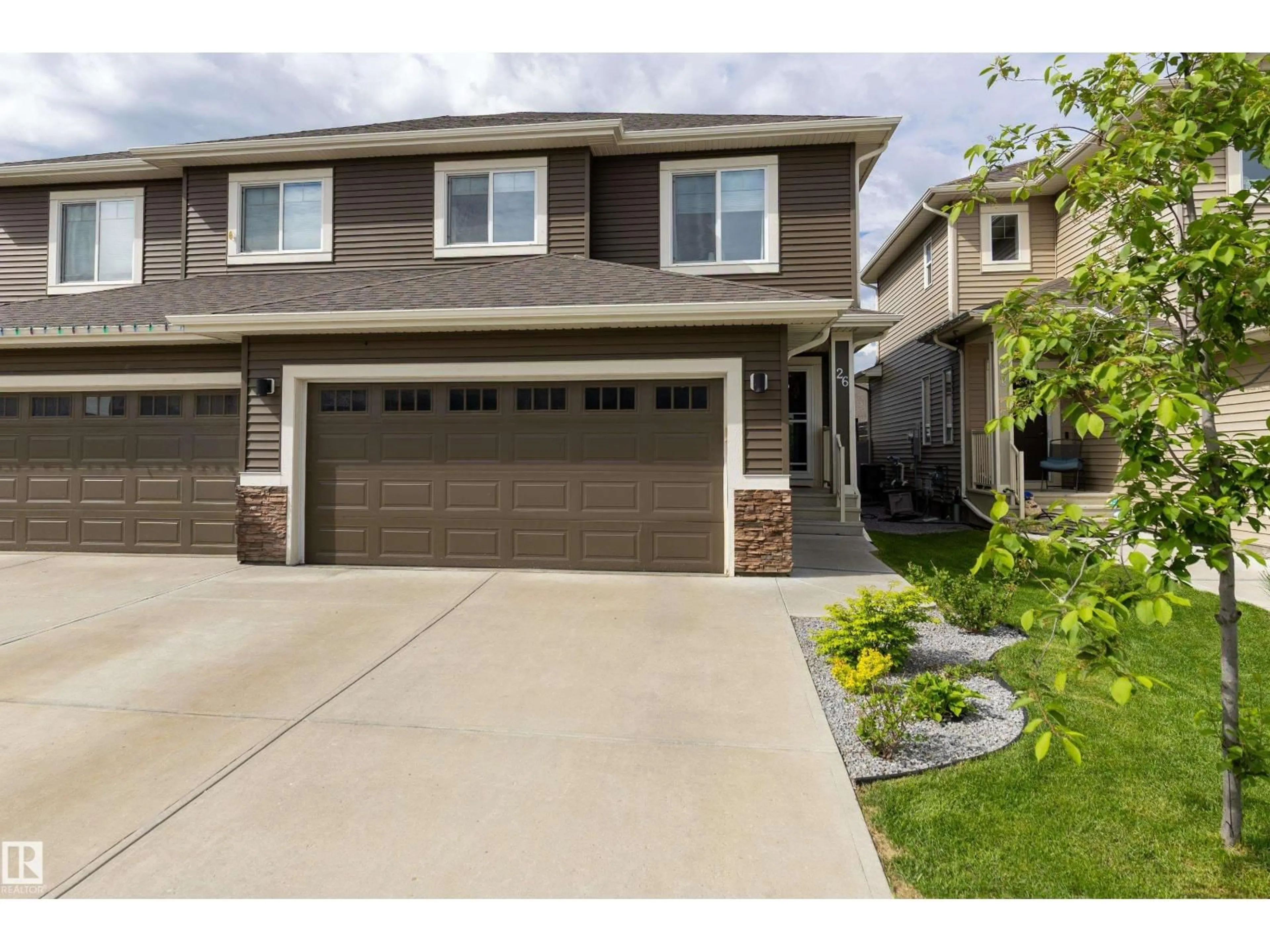 Home with vinyl exterior material, street for 26 RANCHER RD, Ardrossan Alberta T8E0A6