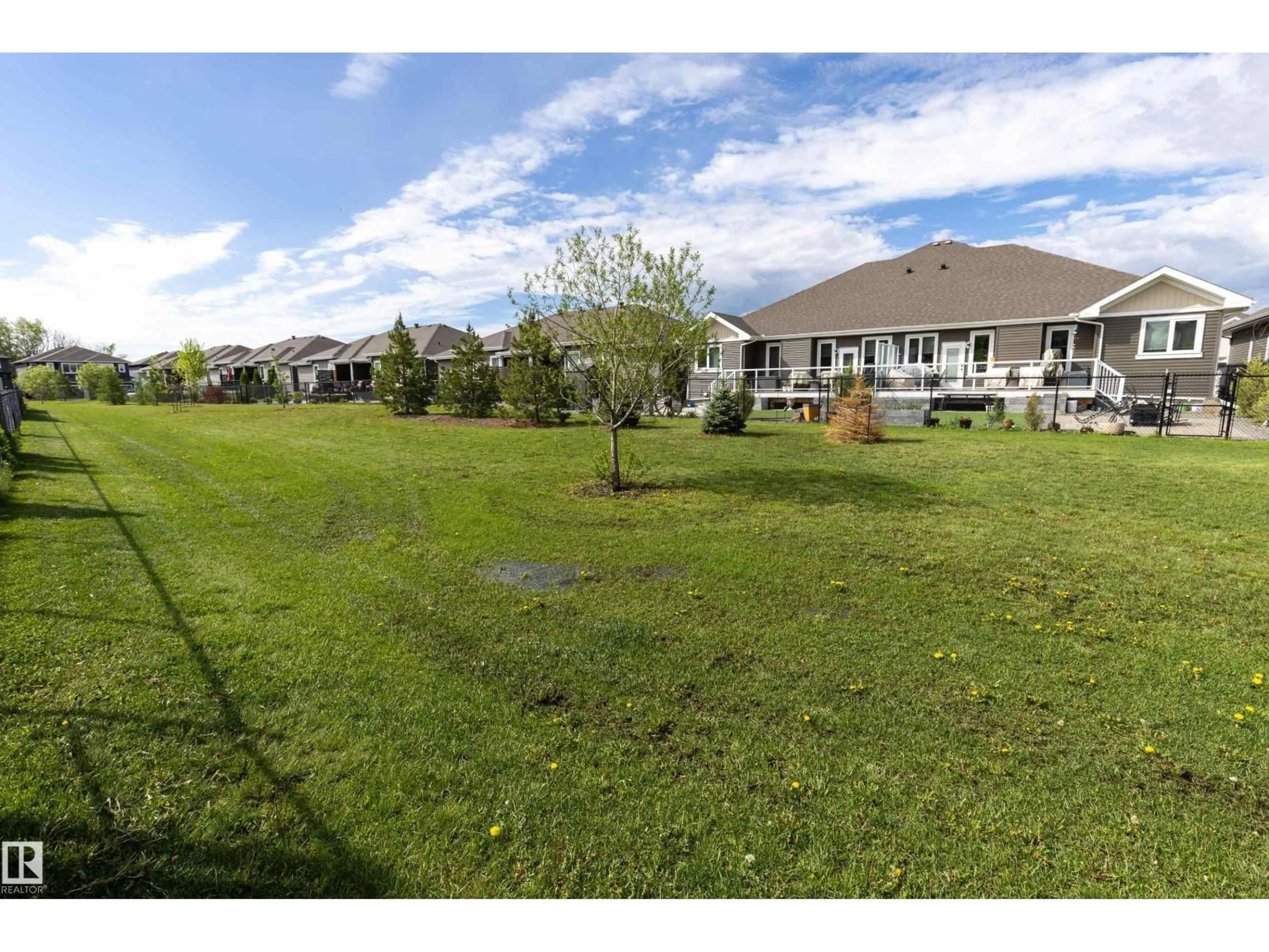 A pic from outside/outdoor area/front of a property/back of a property/a pic from drone, water/lake/river/ocean view for 26 RANCHER RD, Ardrossan Alberta T8E0A6