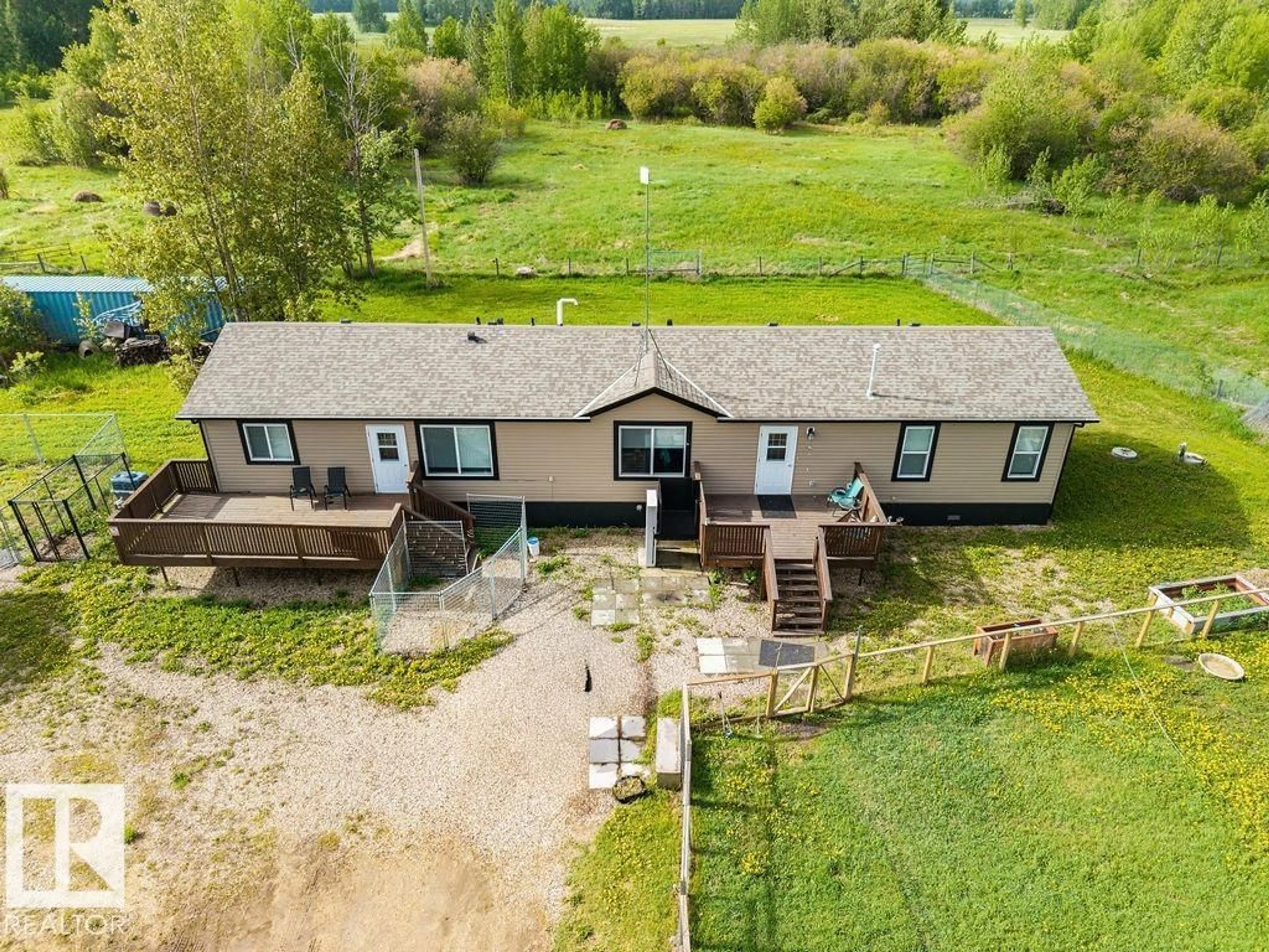 A pic from outside/outdoor area/front of a property/back of a property/a pic from drone, unknown for 2017 TWP RD 554, Rural Lac Ste. Anne County Alberta T0E1V0