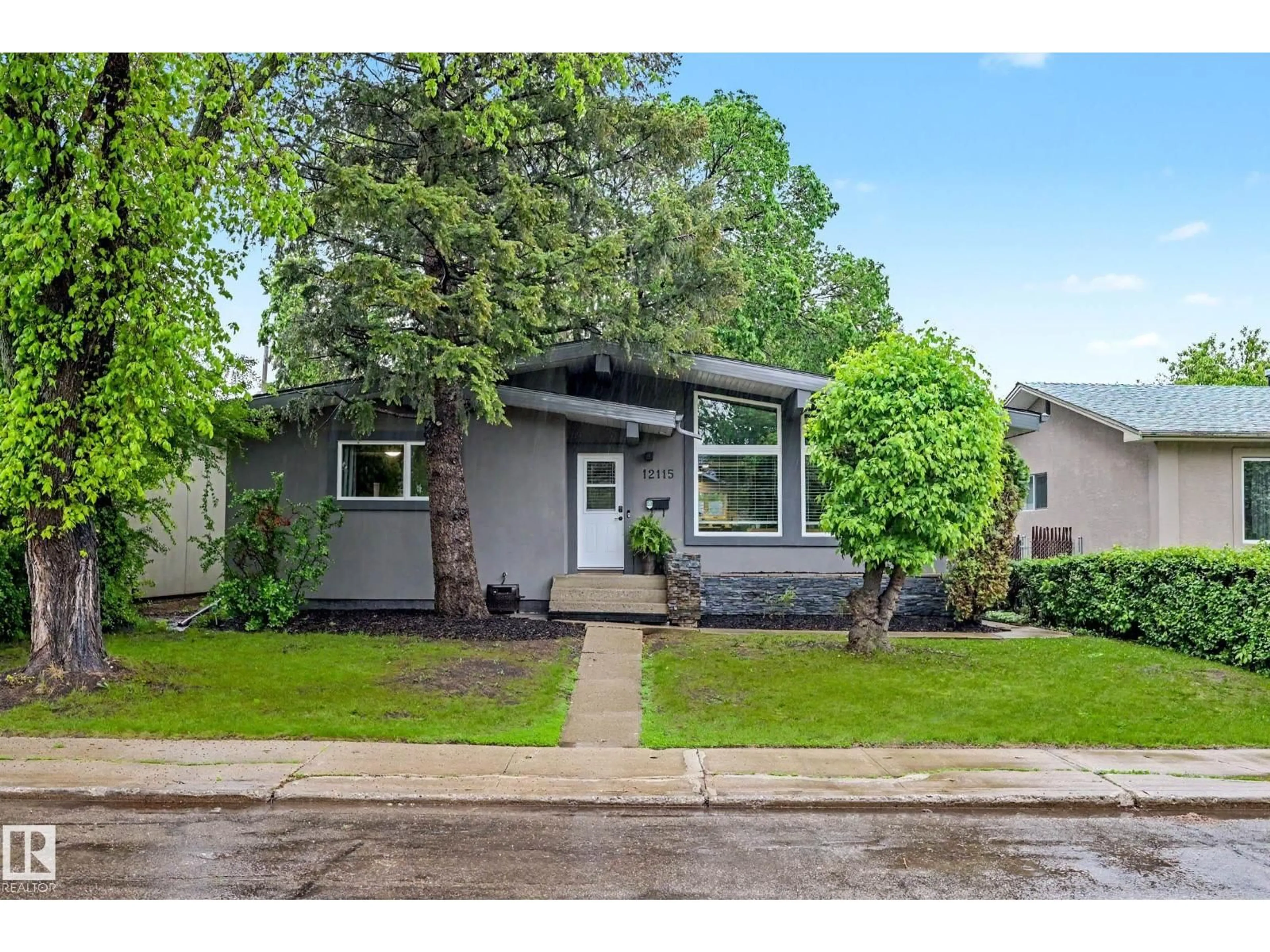 Home with vinyl exterior material, street for 12115 40 AV NW, Edmonton Alberta T6J0S4