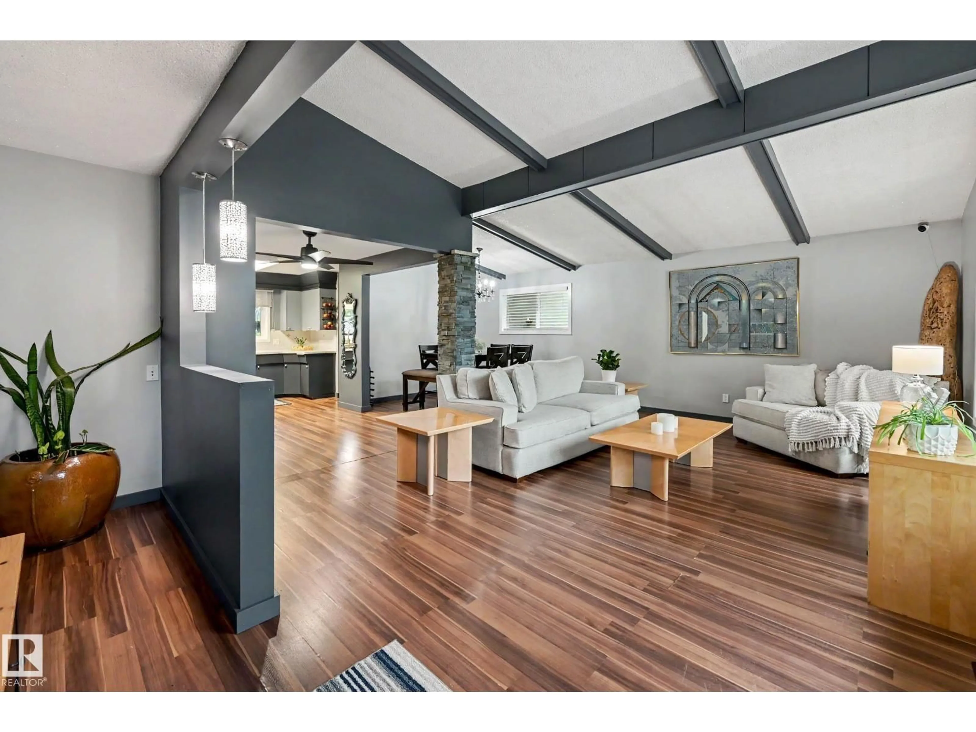 Living room with furniture, wood/laminate floor for 12115 40 AV NW, Edmonton Alberta T6J0S4