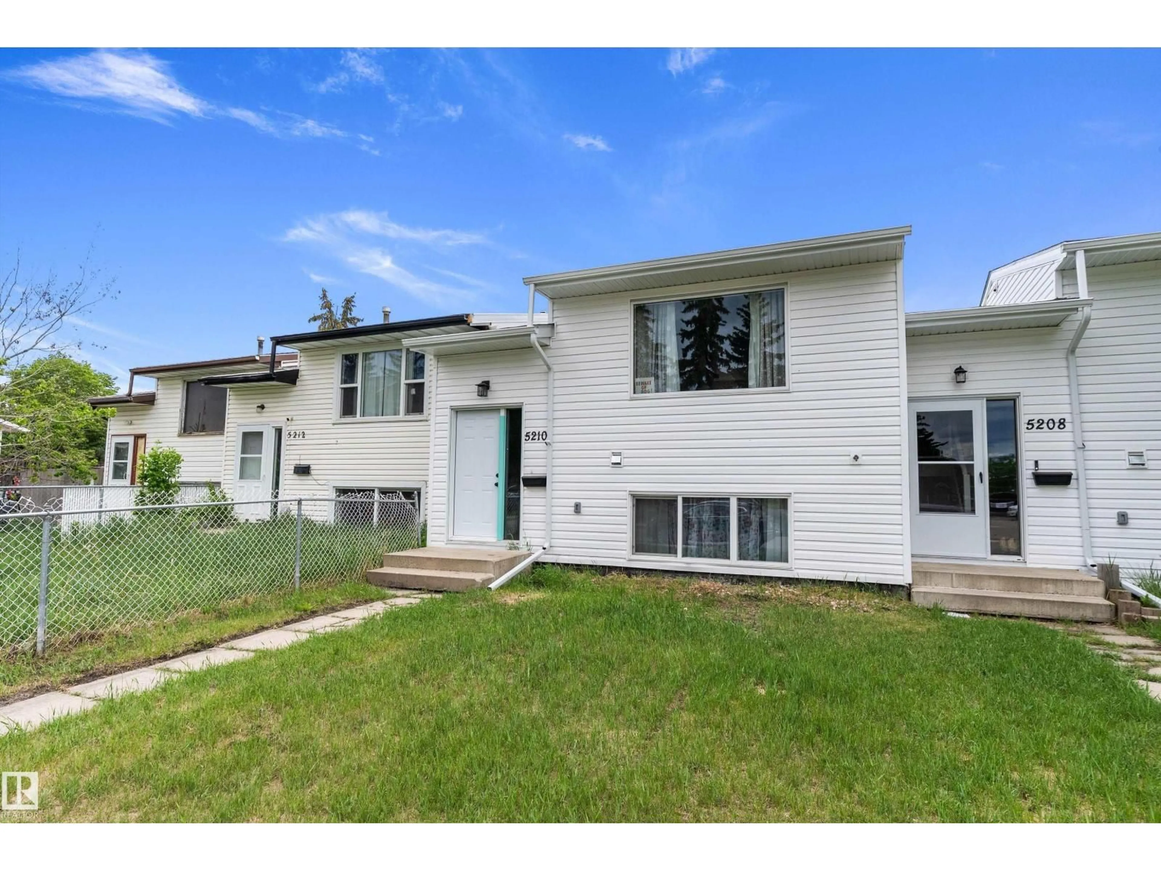 Home with vinyl exterior material, street for 5210 55 AV, Wetaskiwin Alberta T9A2P3