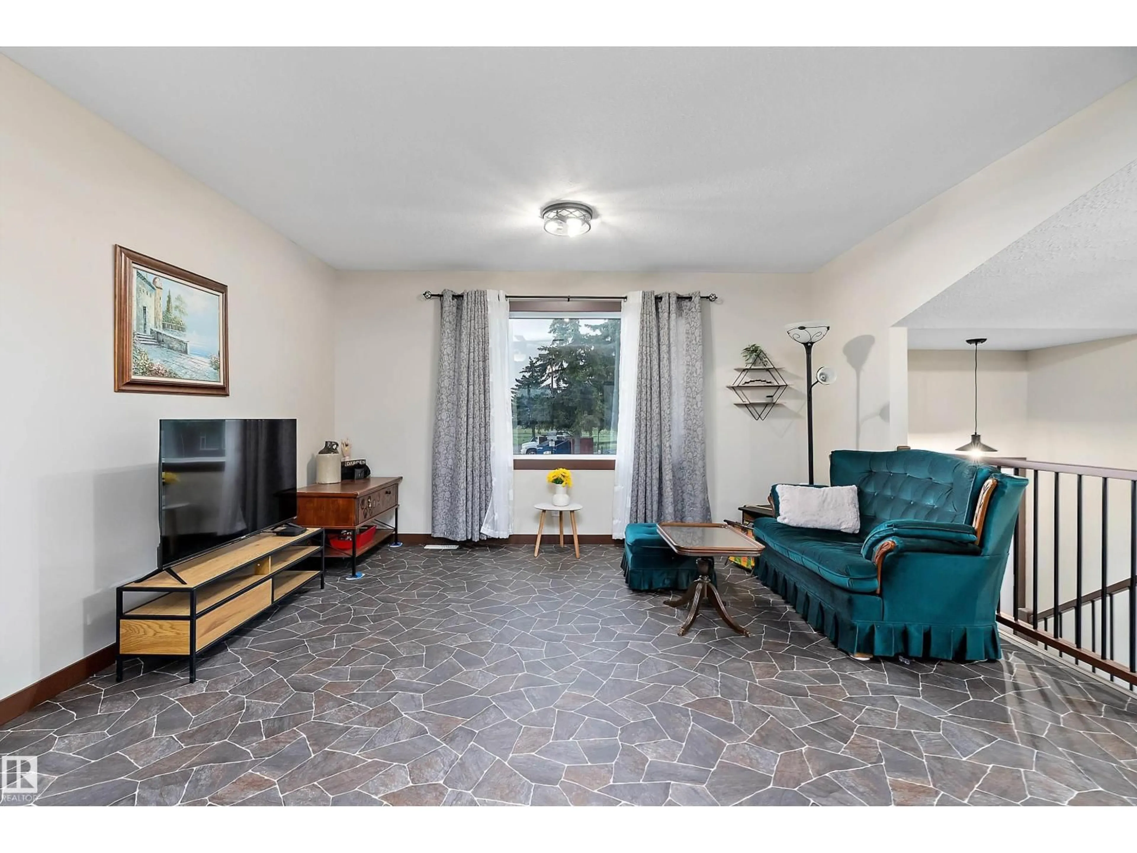 Living room with furniture, ceramic/tile floor for 5210 55 AV, Wetaskiwin Alberta T9A2P3