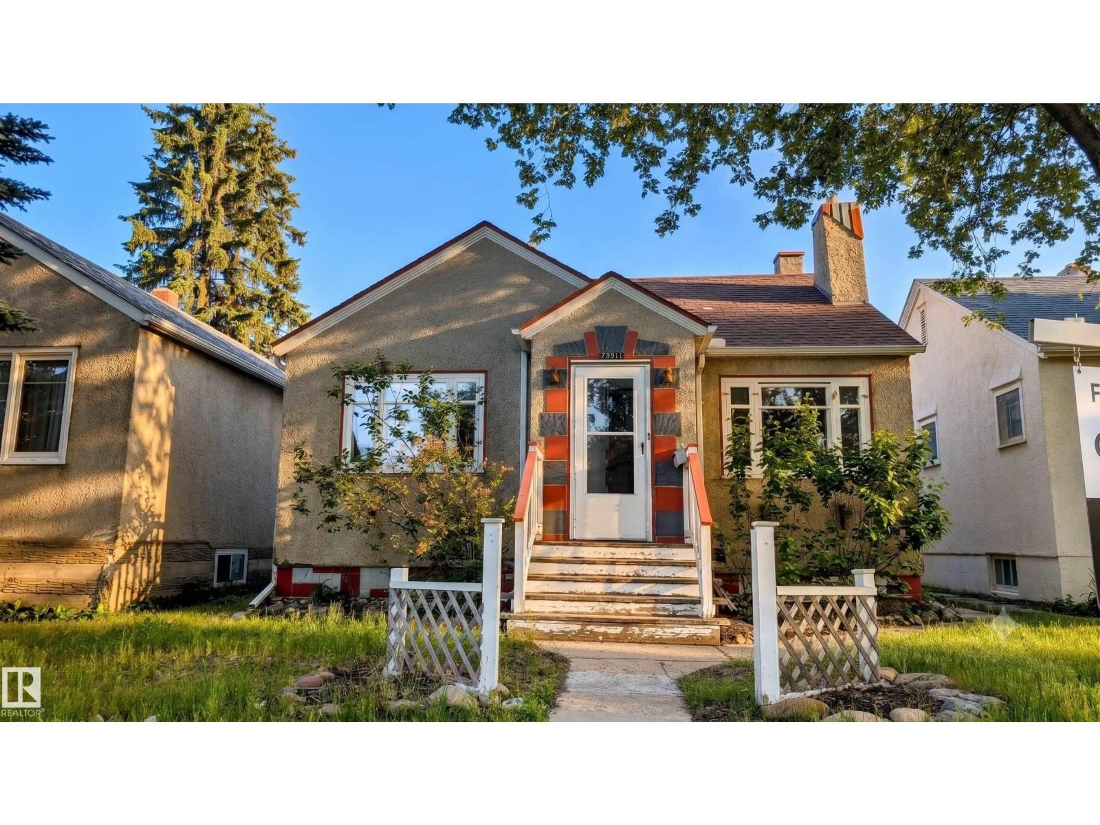 Home with brick exterior material, street for NW - 7611 112 S AV, Edmonton Alberta T5B0H4