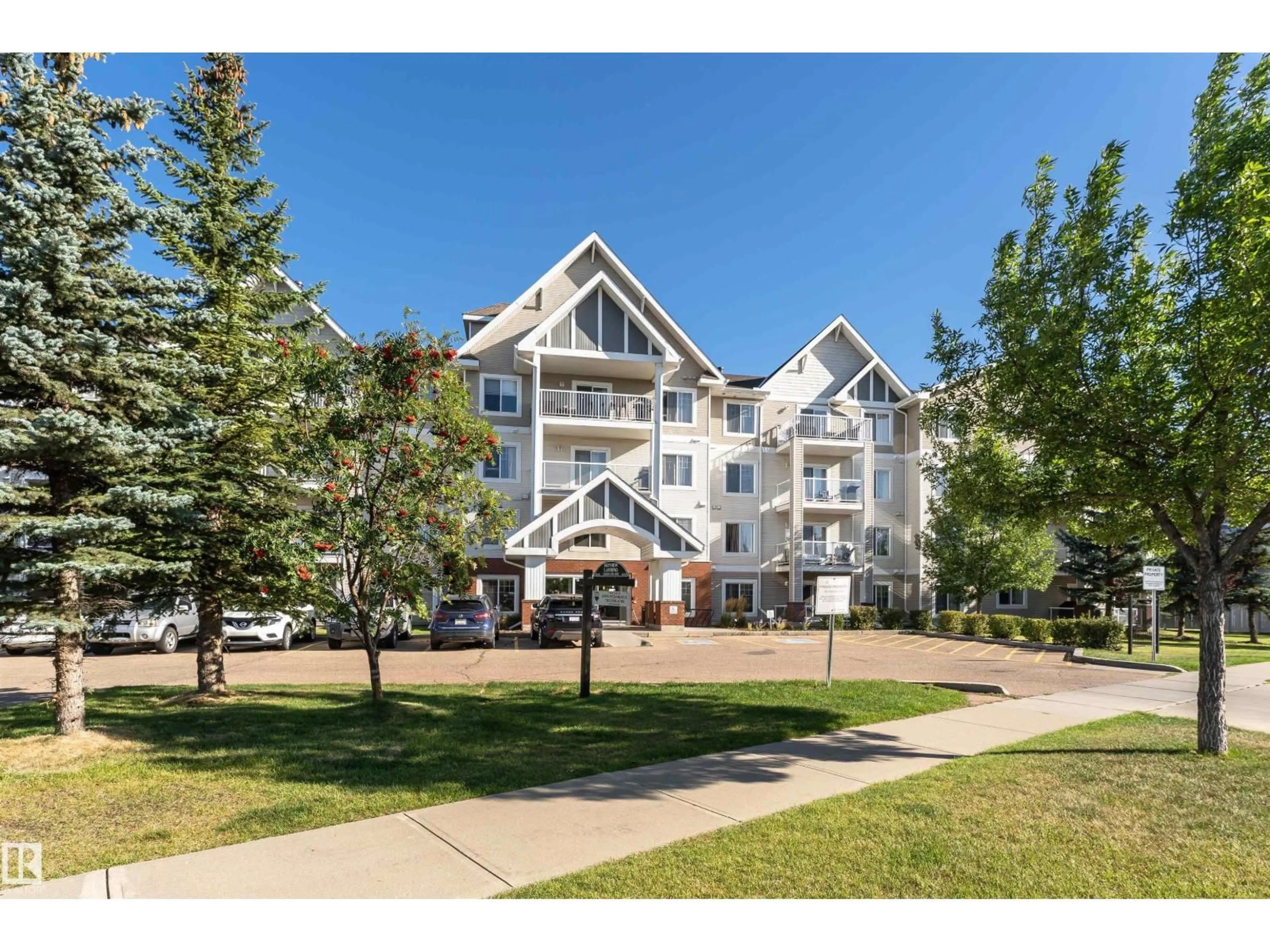 A pic from outside/outdoor area/front of a property/back of a property/a pic from drone, mountain view for #318 - 13830 150 AV, Edmonton Alberta T6V1X2