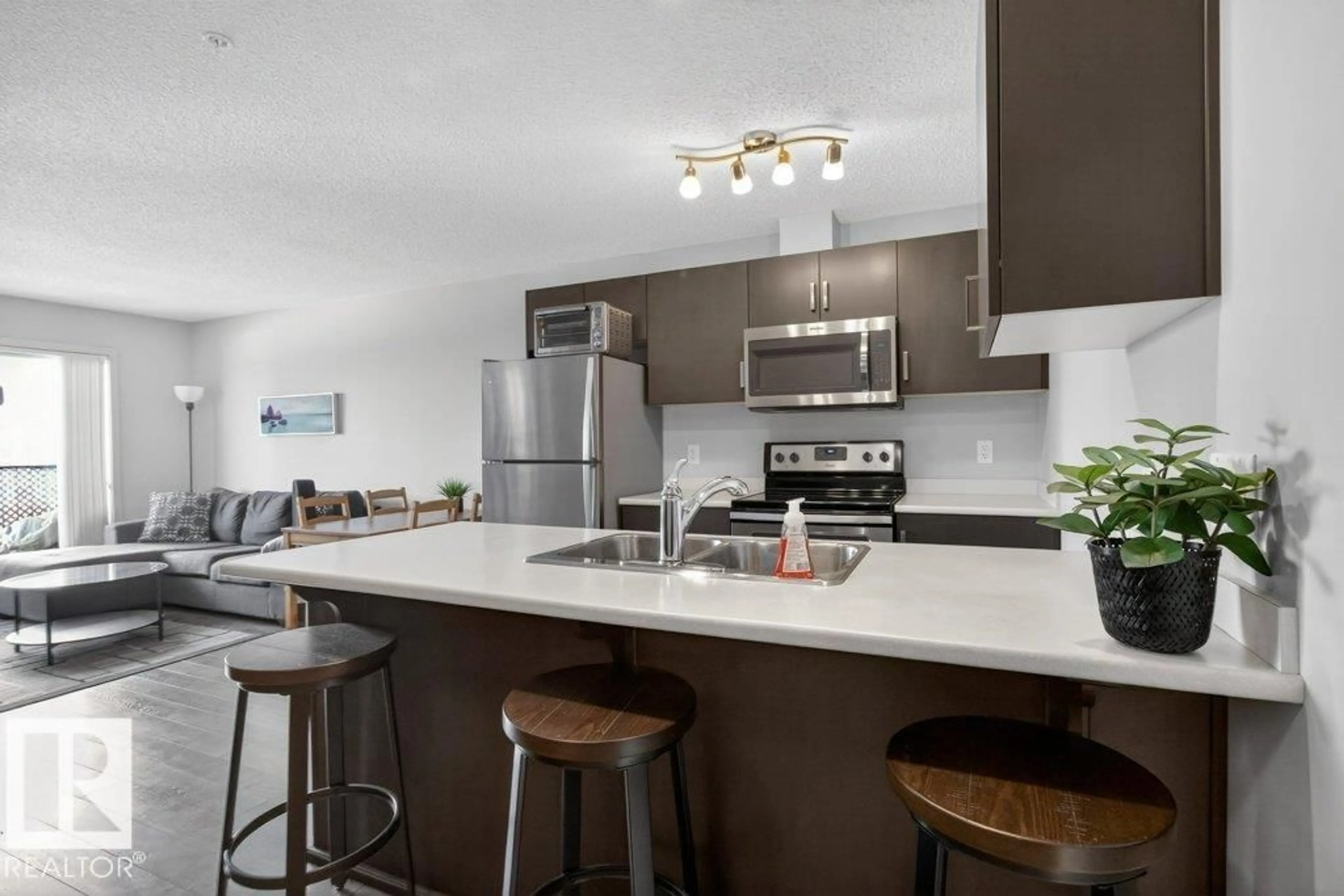Open concept kitchen, unknown for 315 EBBERS BV, Edmonton Alberta T5Y3W2