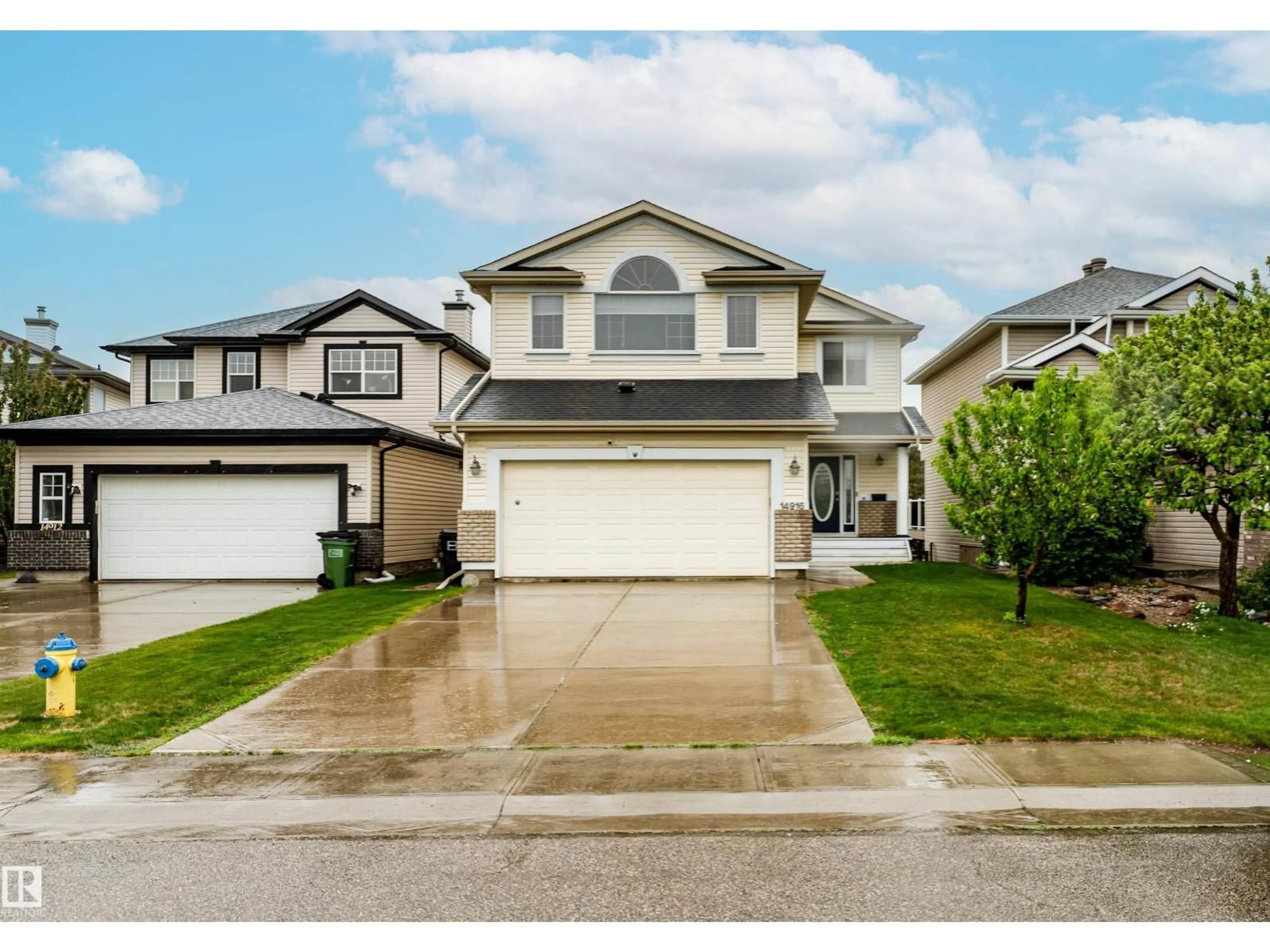 Home with vinyl exterior material, street for 14916 136 ST, Edmonton Alberta T6V1M3