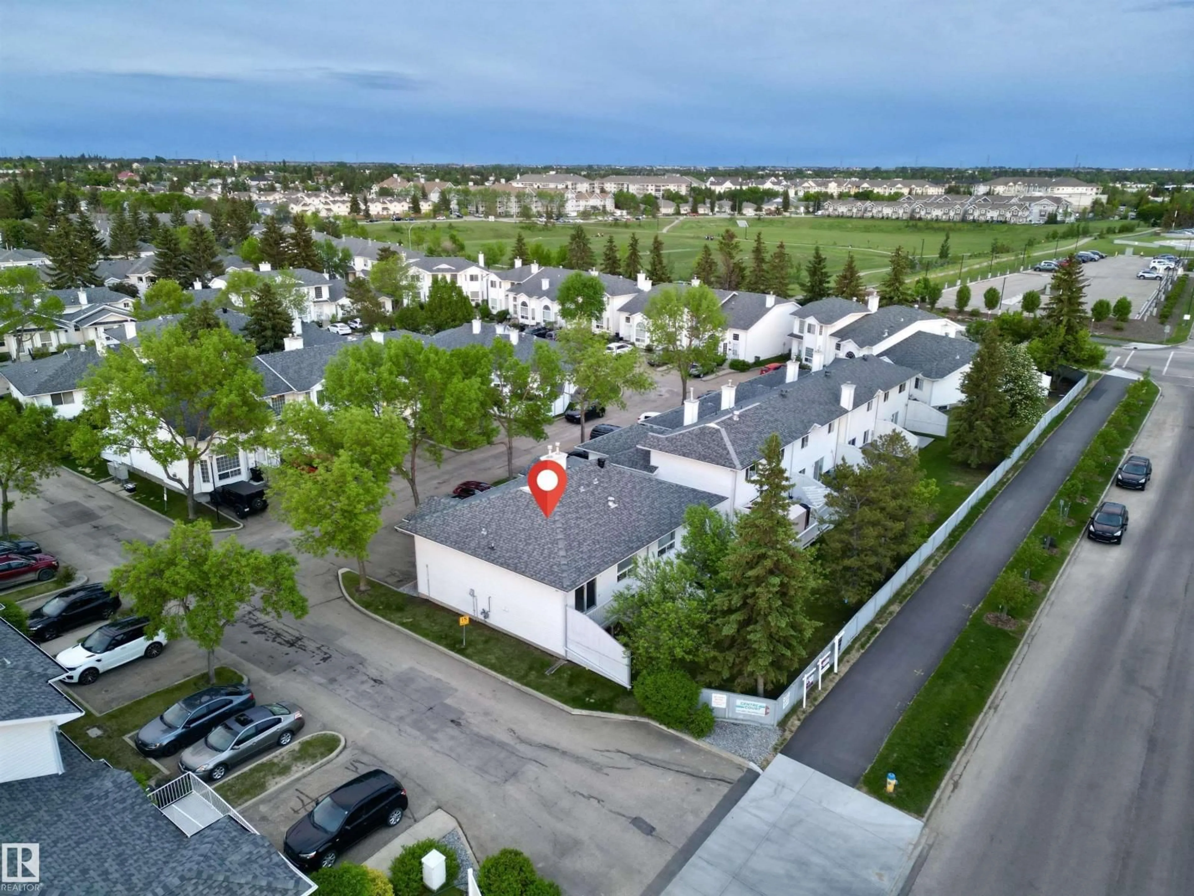A pic from outside/outdoor area/front of a property/back of a property/a pic from drone, street for #2 - 3311 58 ST, Edmonton Alberta T6L6X3