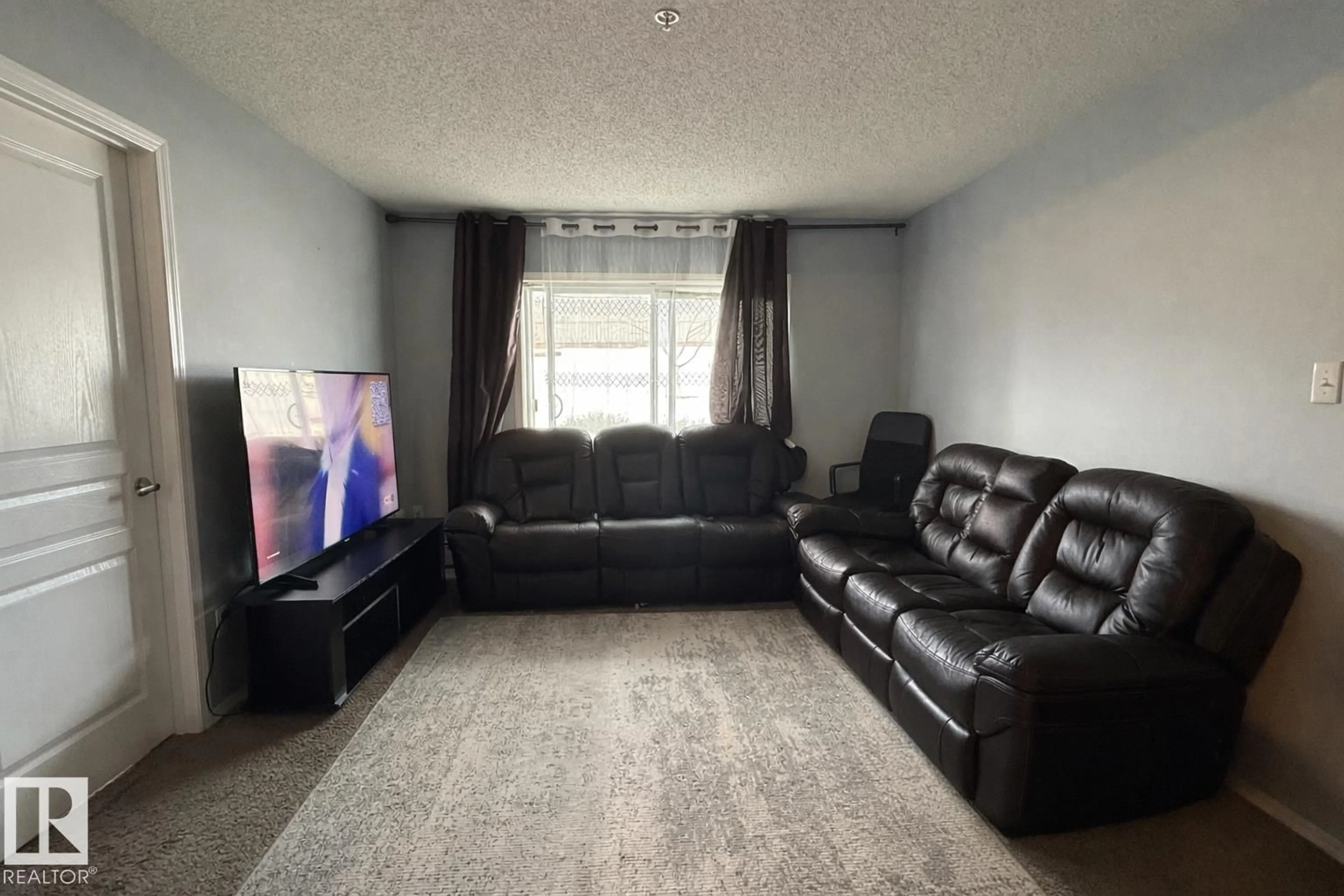 Living room with furniture, unknown for #133 - 301 CLAREVIEW STATION DR DR, Edmonton Alberta T5L0B8