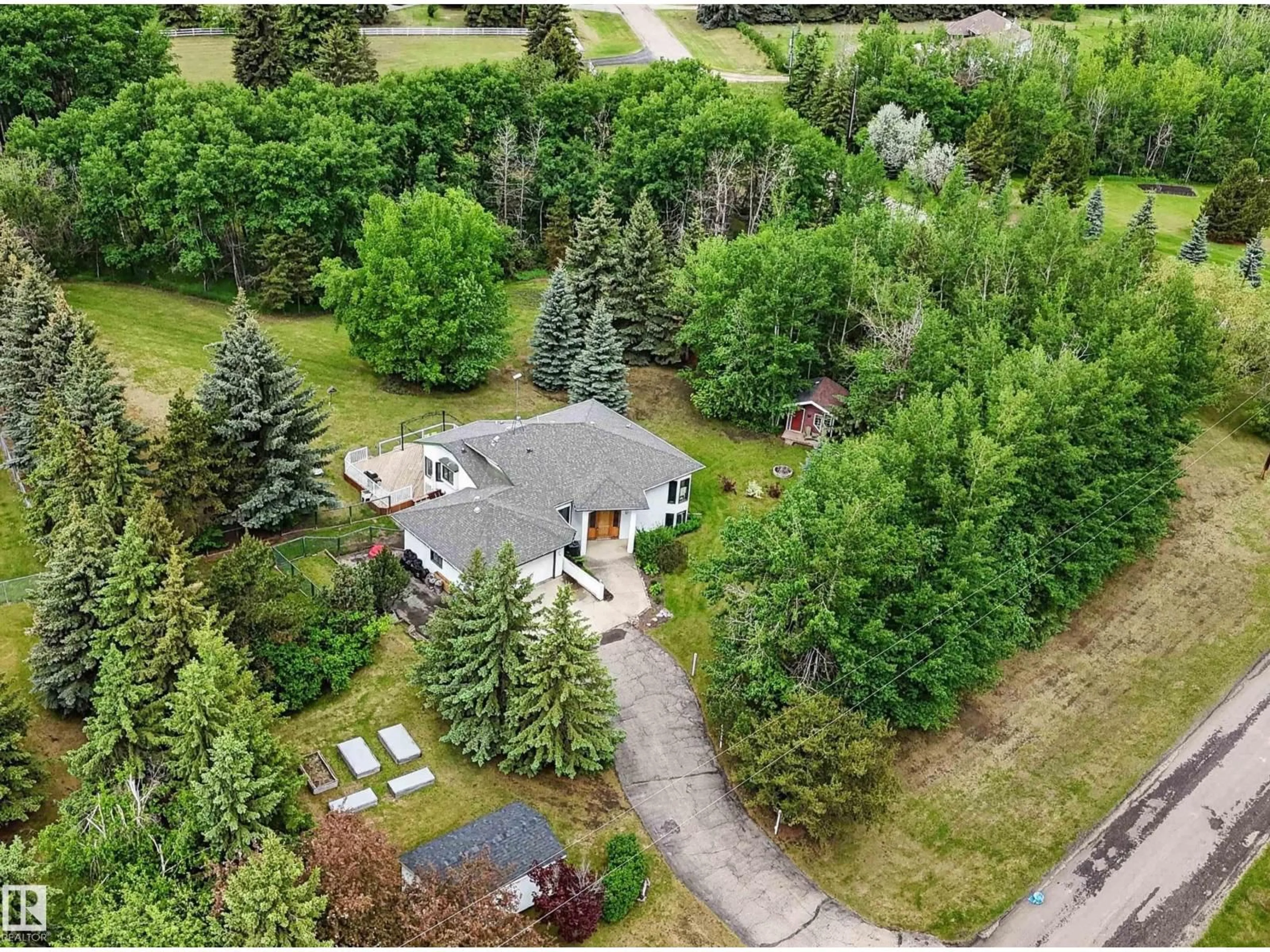 A pic from outside/outdoor area/front of a property/back of a property/a pic from drone, forest/trees view for 11922 226 ST, Edmonton Alberta T5S2C2