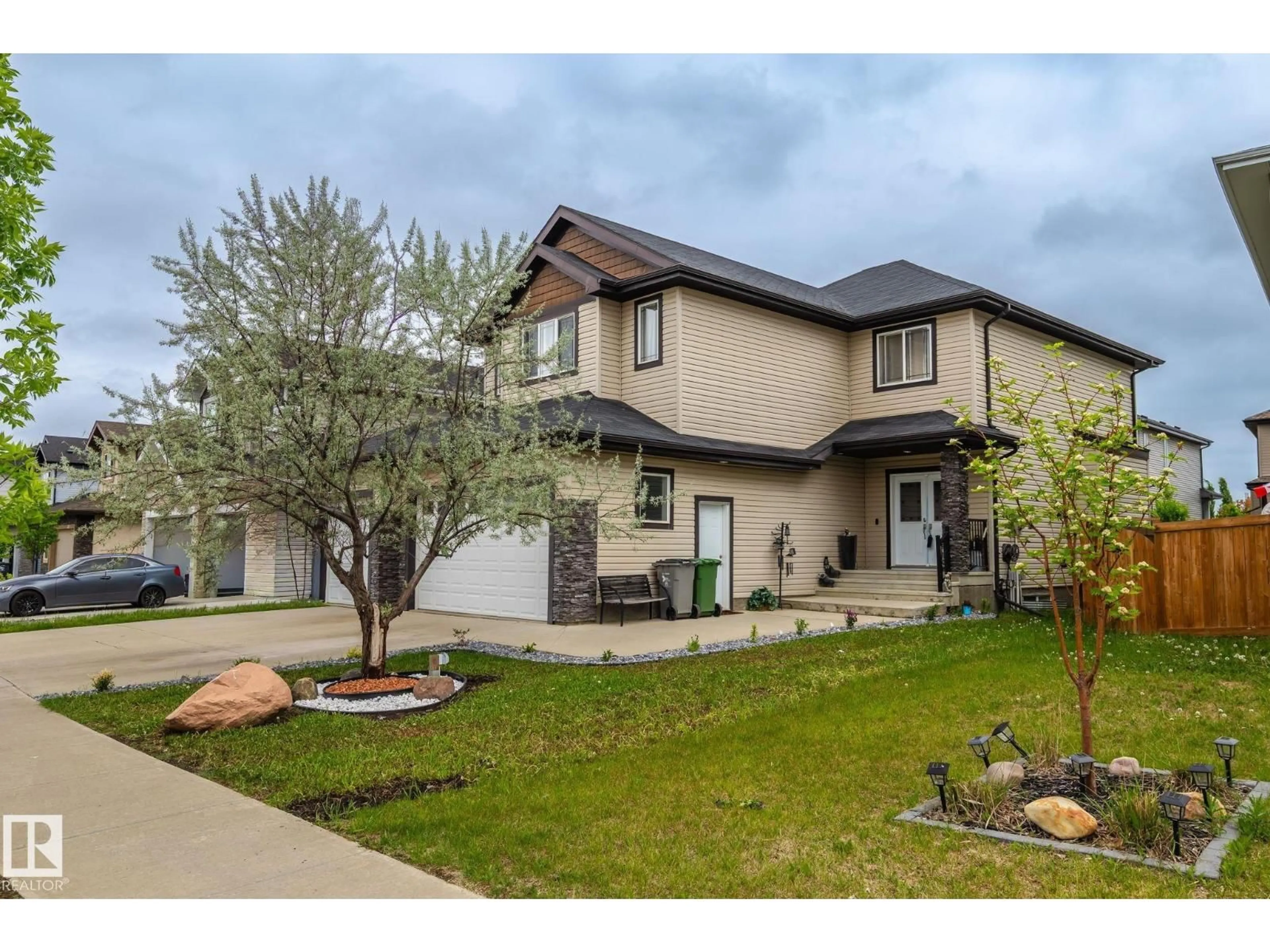 Home with vinyl exterior material, street for 3808 TRIOMPHE BV, Beaumont Alberta T4X0C4